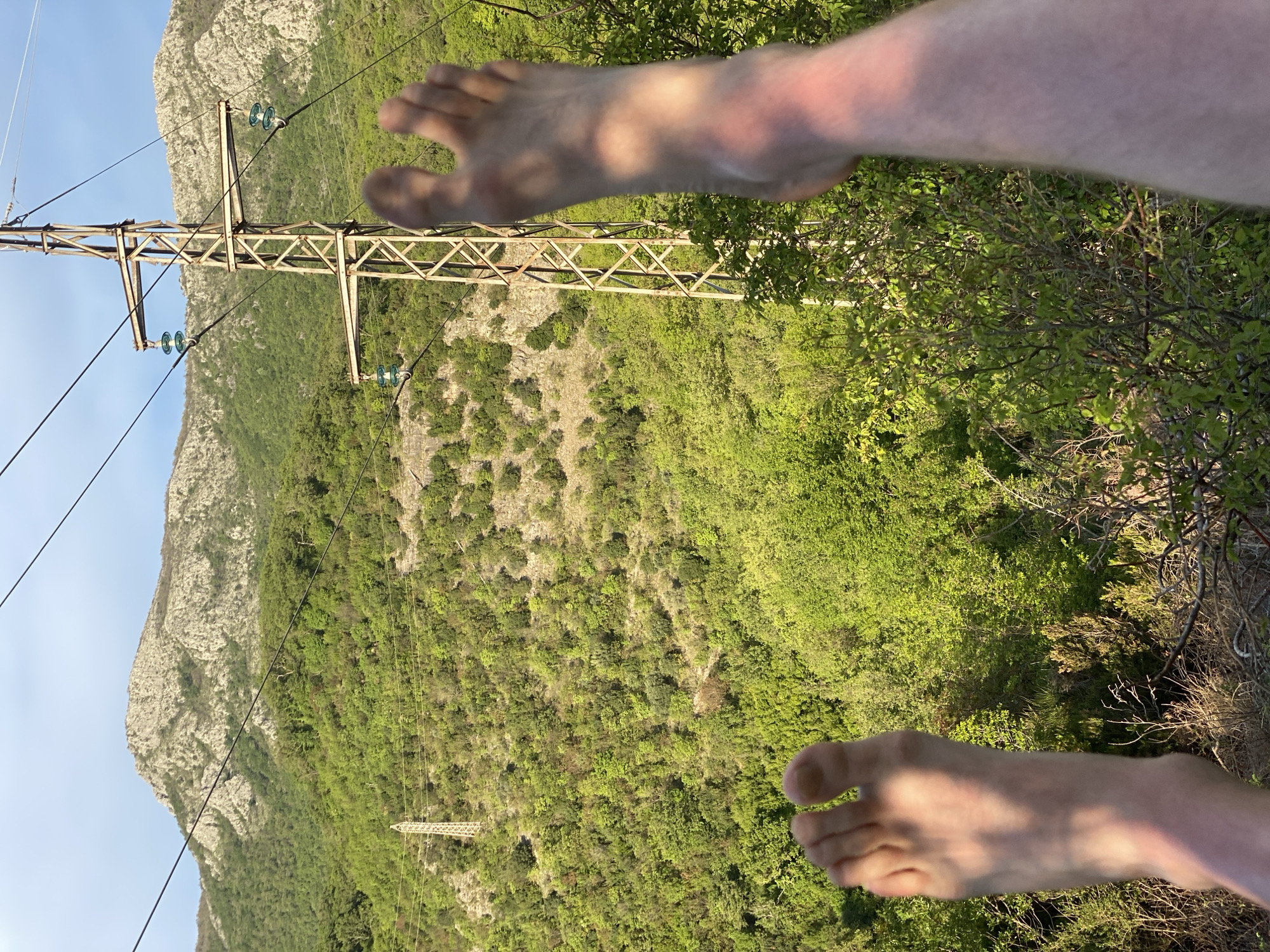 Hiker captures barefoot mountain view in Montenegro