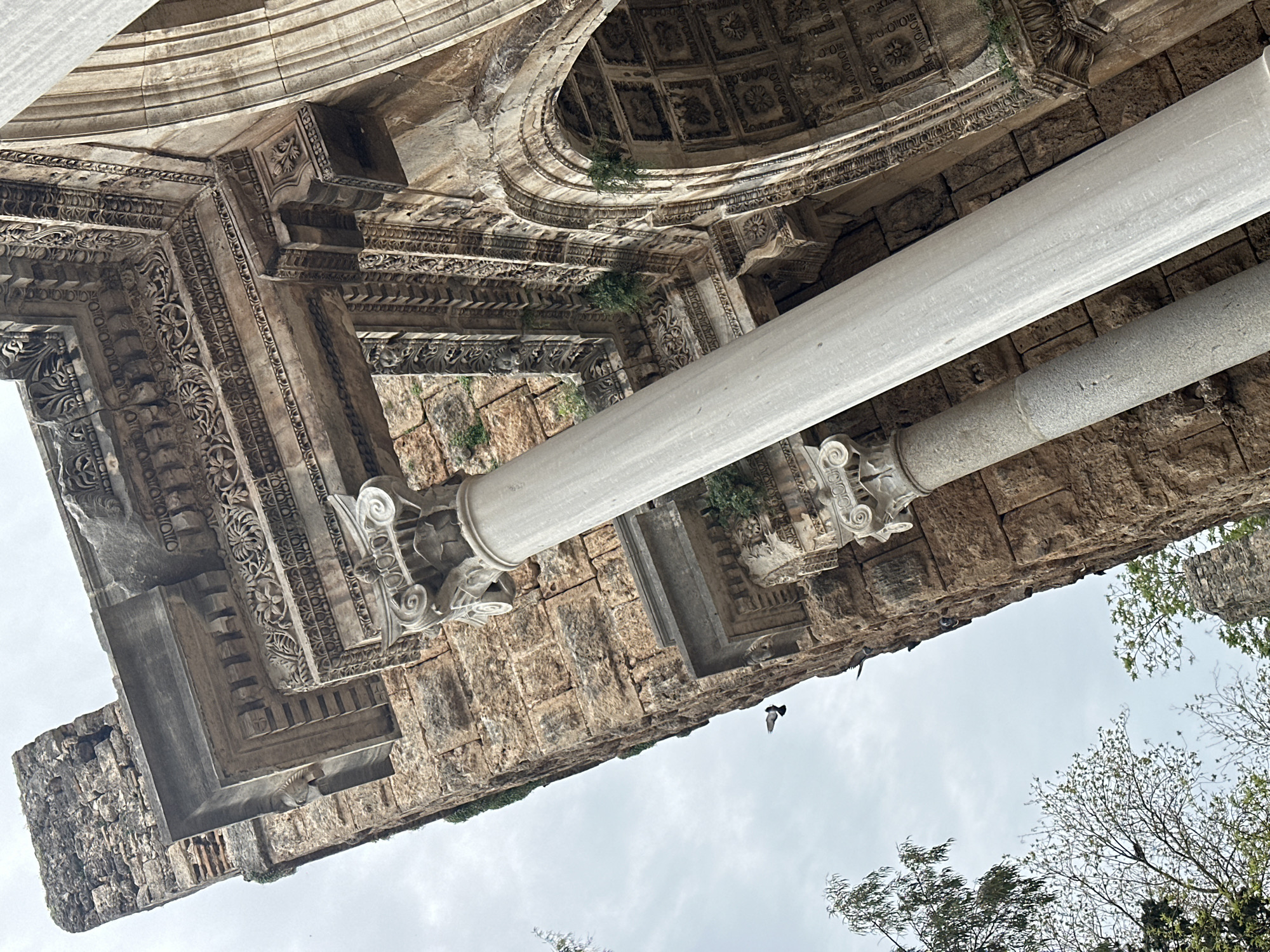 Tourist explores historic Antalya landmarks and local culture