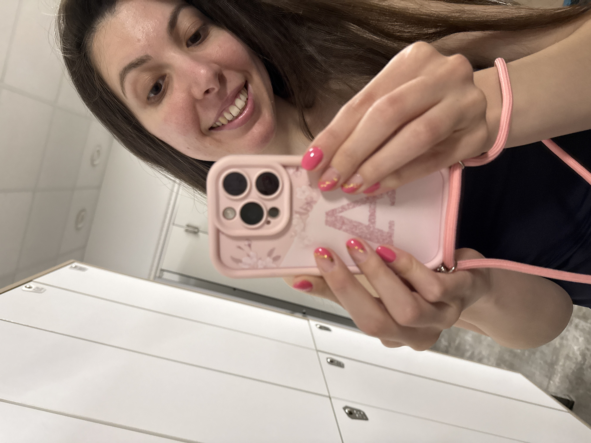 Fitness studio moments captured: aerial yoga and locker room selfies