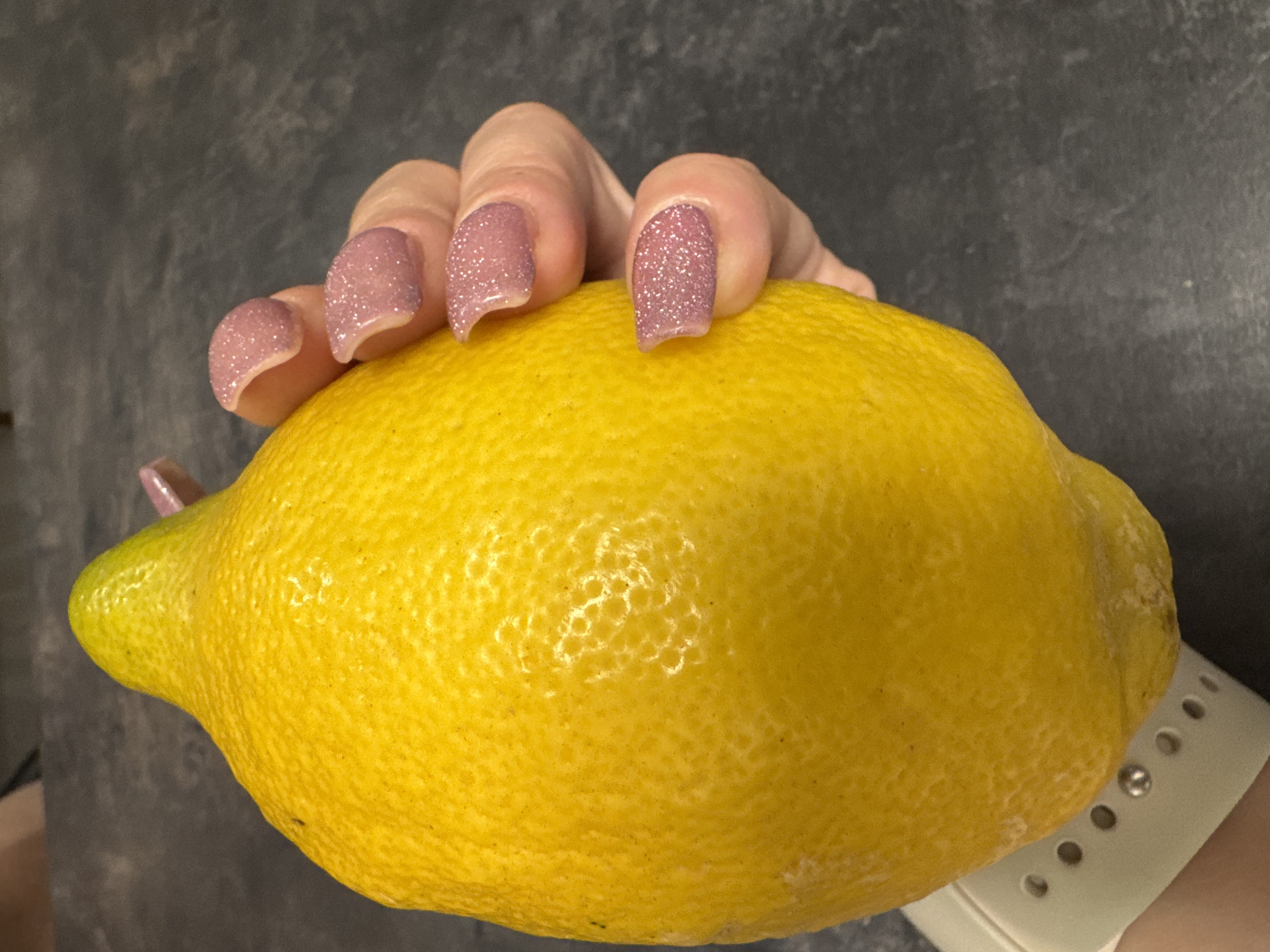 Woman photographed with fruits in intimate portrait session, Poznan