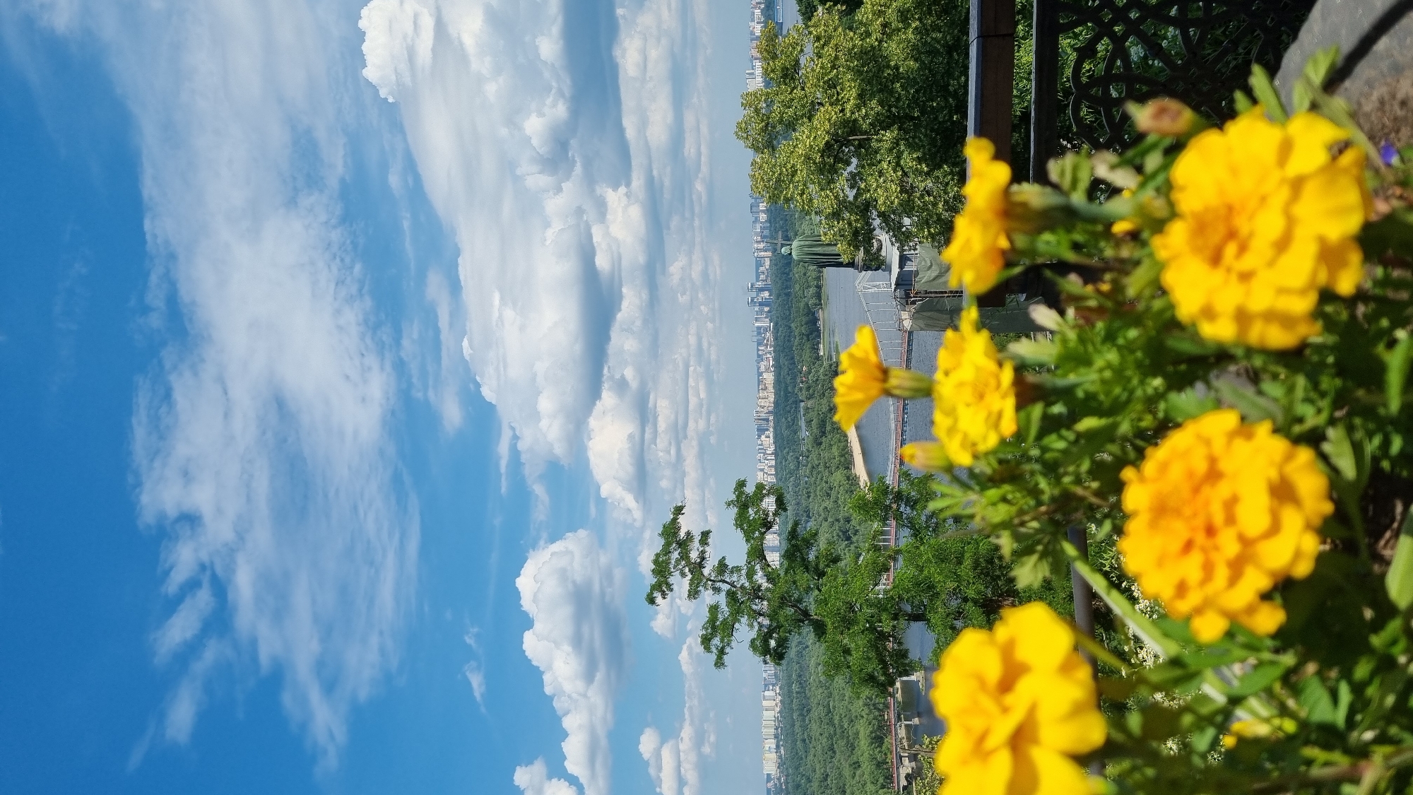 Kyiv's riverside park on a bright summer afternoon