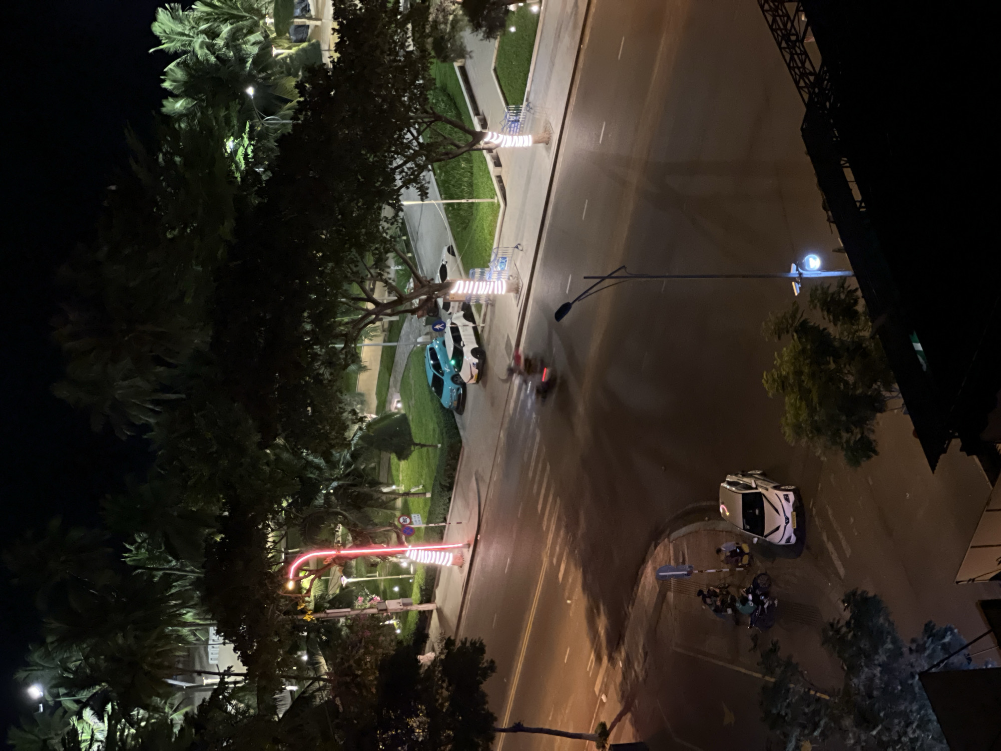 Nha Trang beachside street glows at night from multiple angles