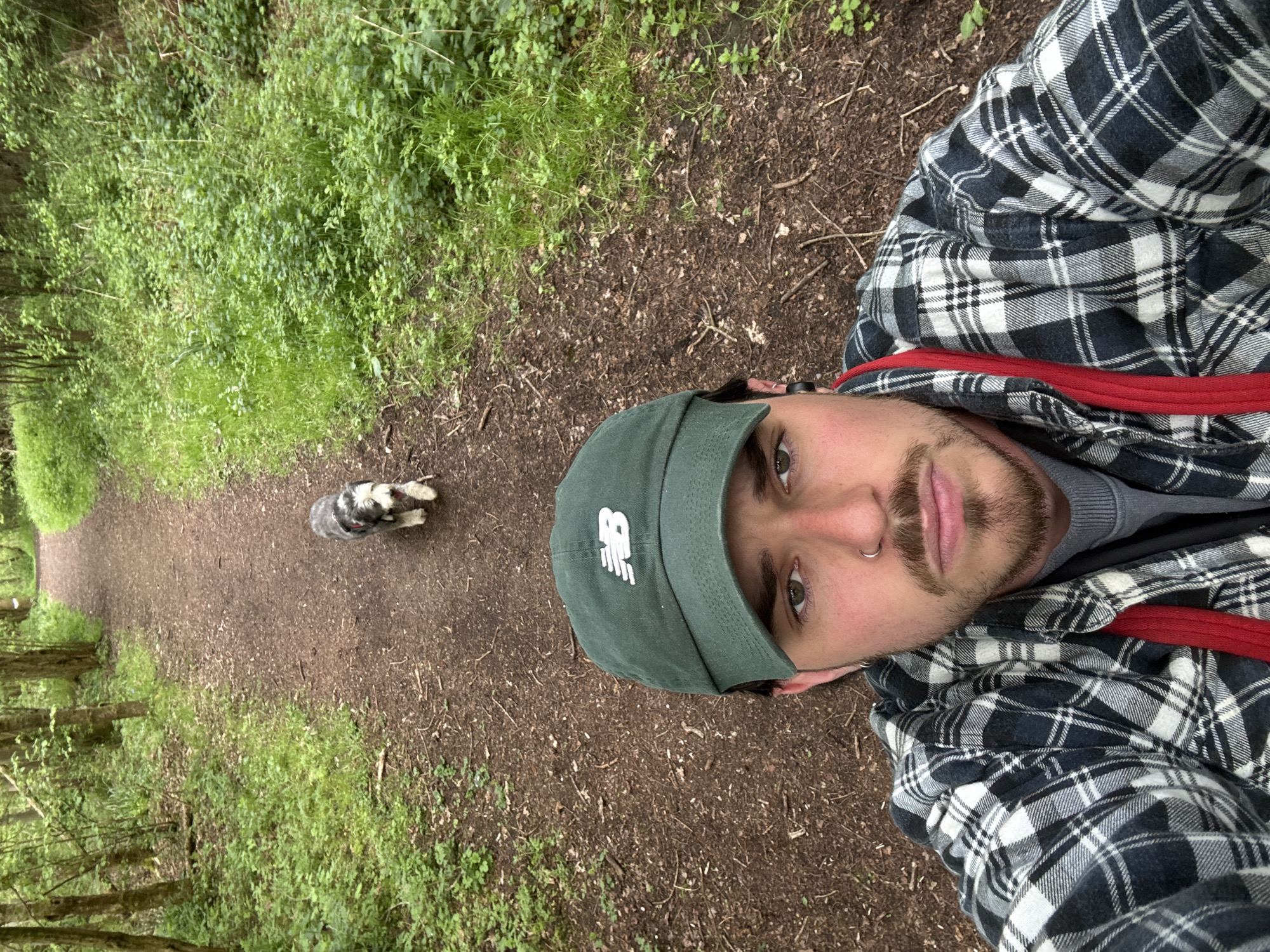 Man takes trail selfie, photographs dog during morning hike