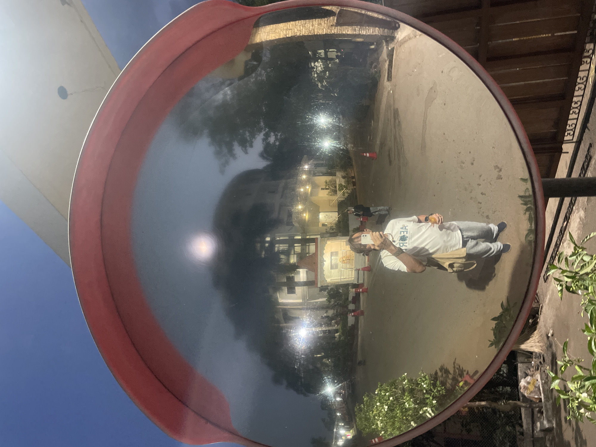 Nighttime selfie captured at illuminated Hindu temple in Mumbai