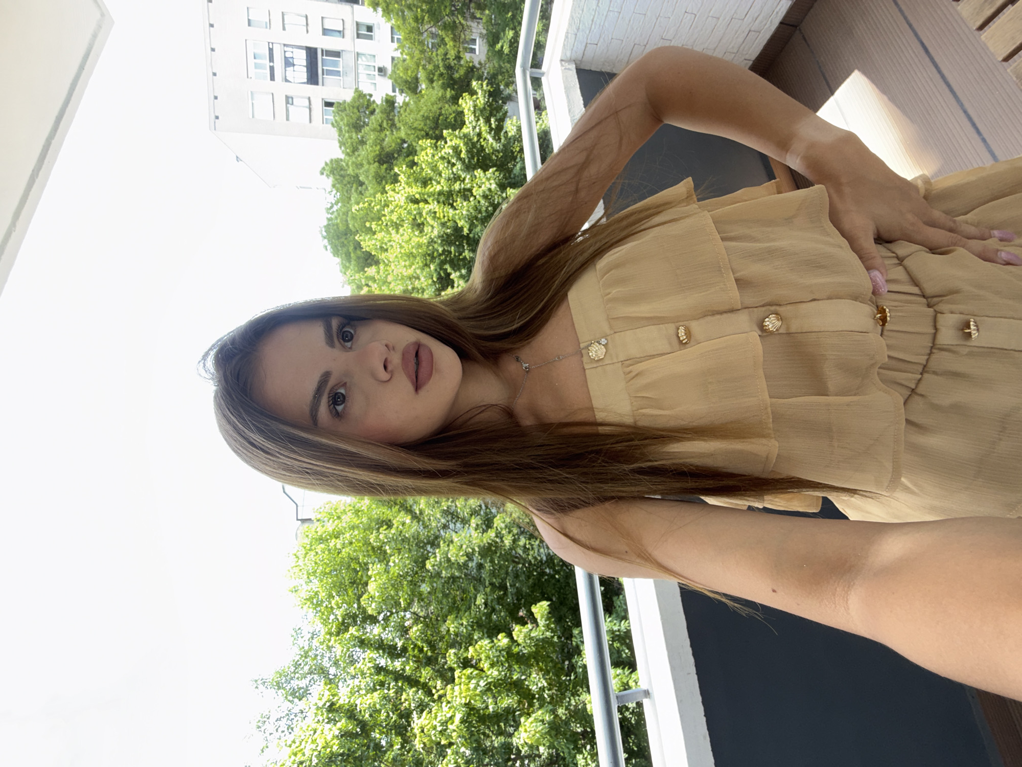Woman takes morning selfie session on Plovdiv balcony
