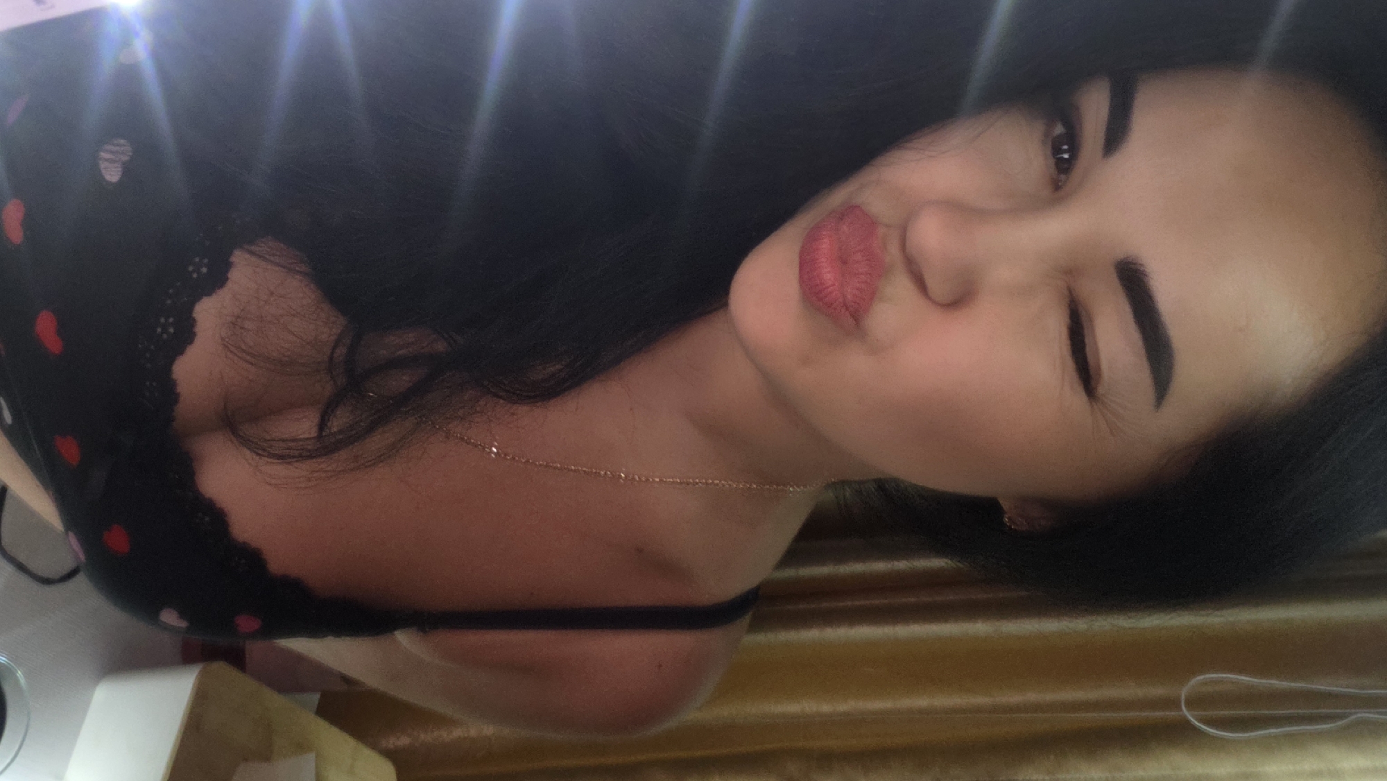 Close-up selfie series with consistent styling, dim indoor setting