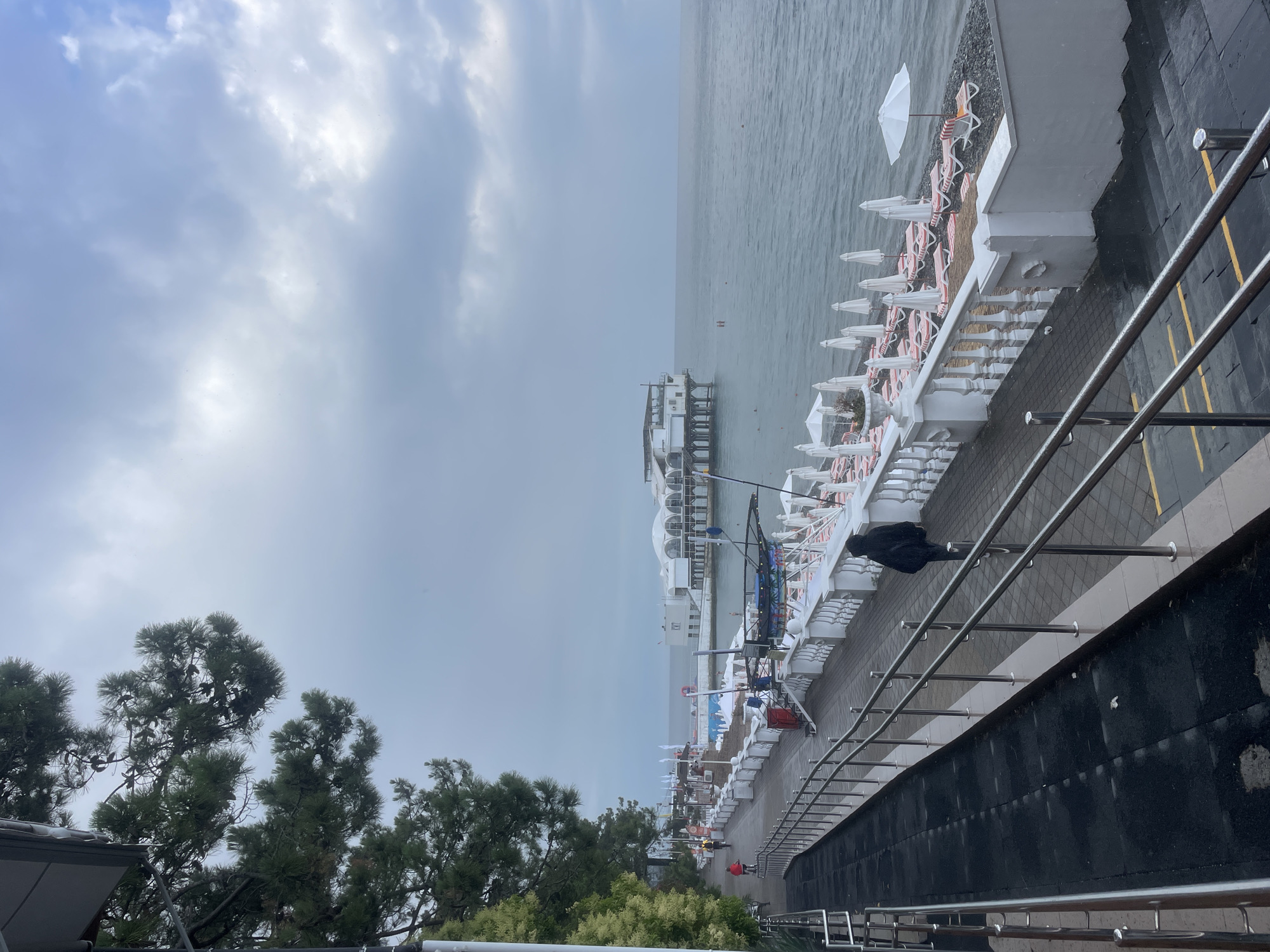 Sochi's Black Sea promenade on a cloudy summer morning