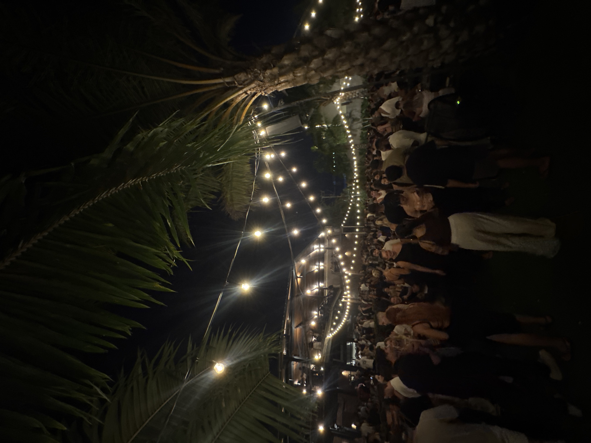 Nighttime outdoor party draws crowds in North Kuta, Indonesia
