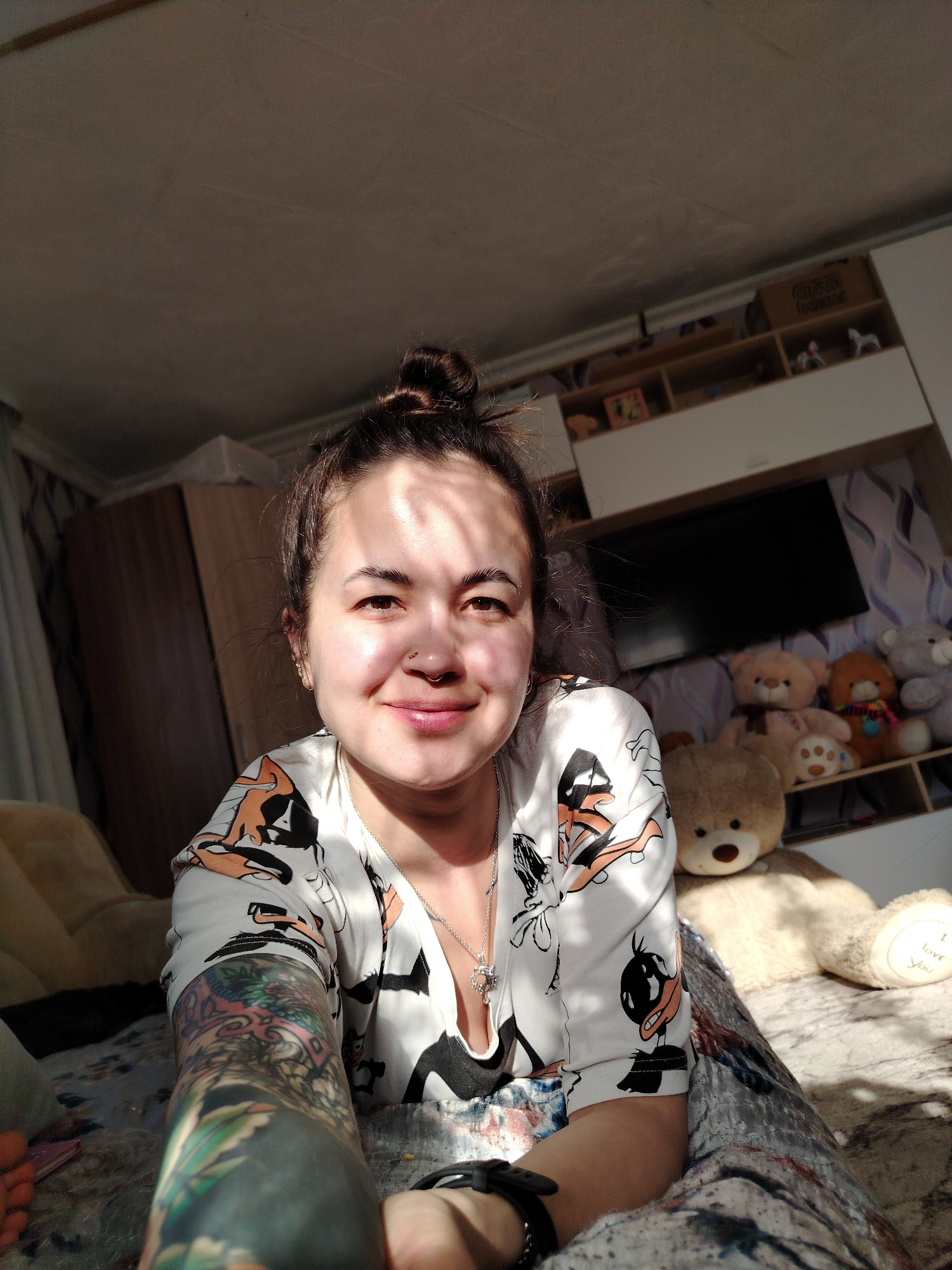 Woman takes selfies with houseplant in Гожан, Russia