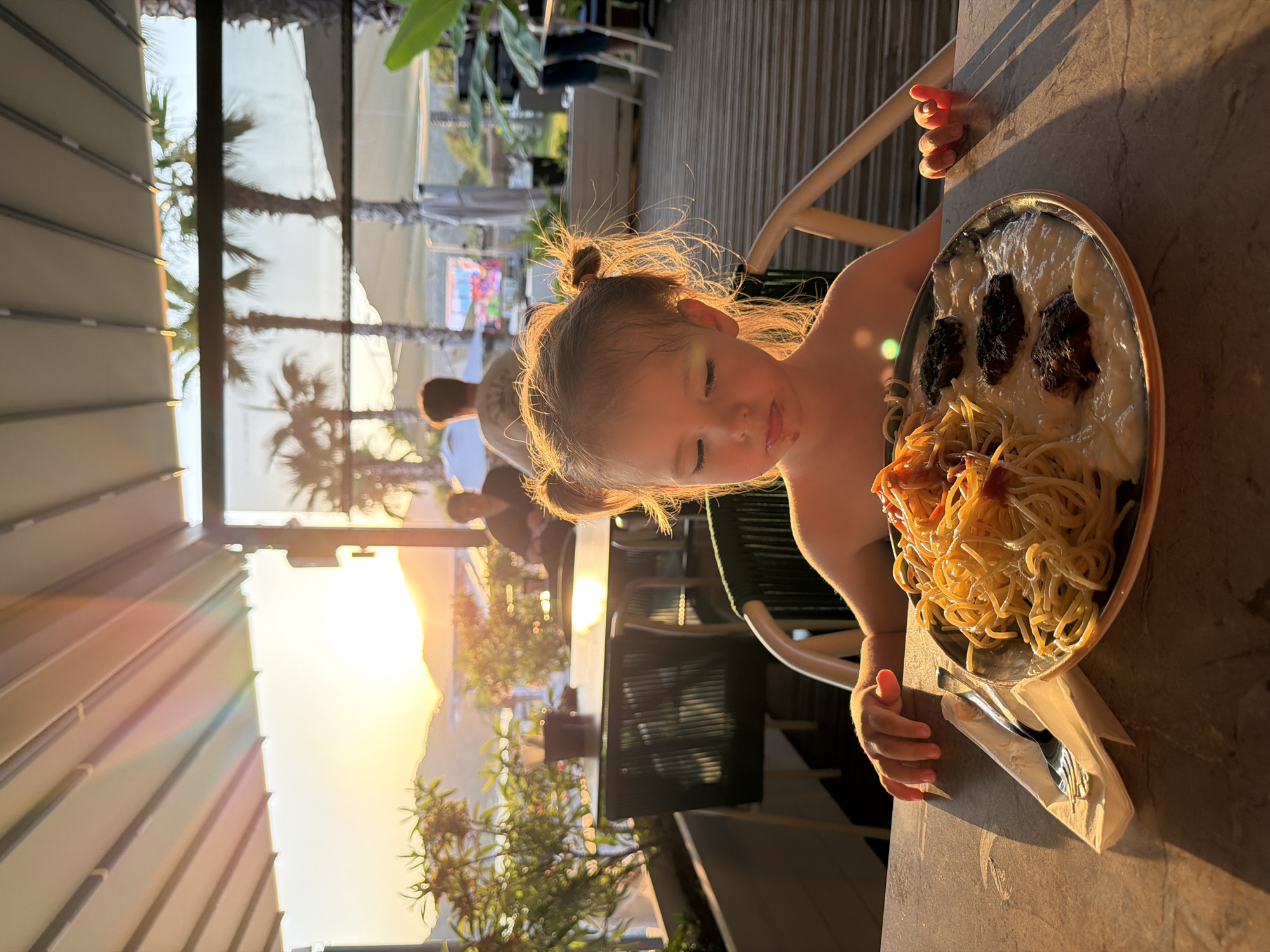Spaghetti dinner at sunset, outdoor restaurant in Fethiye