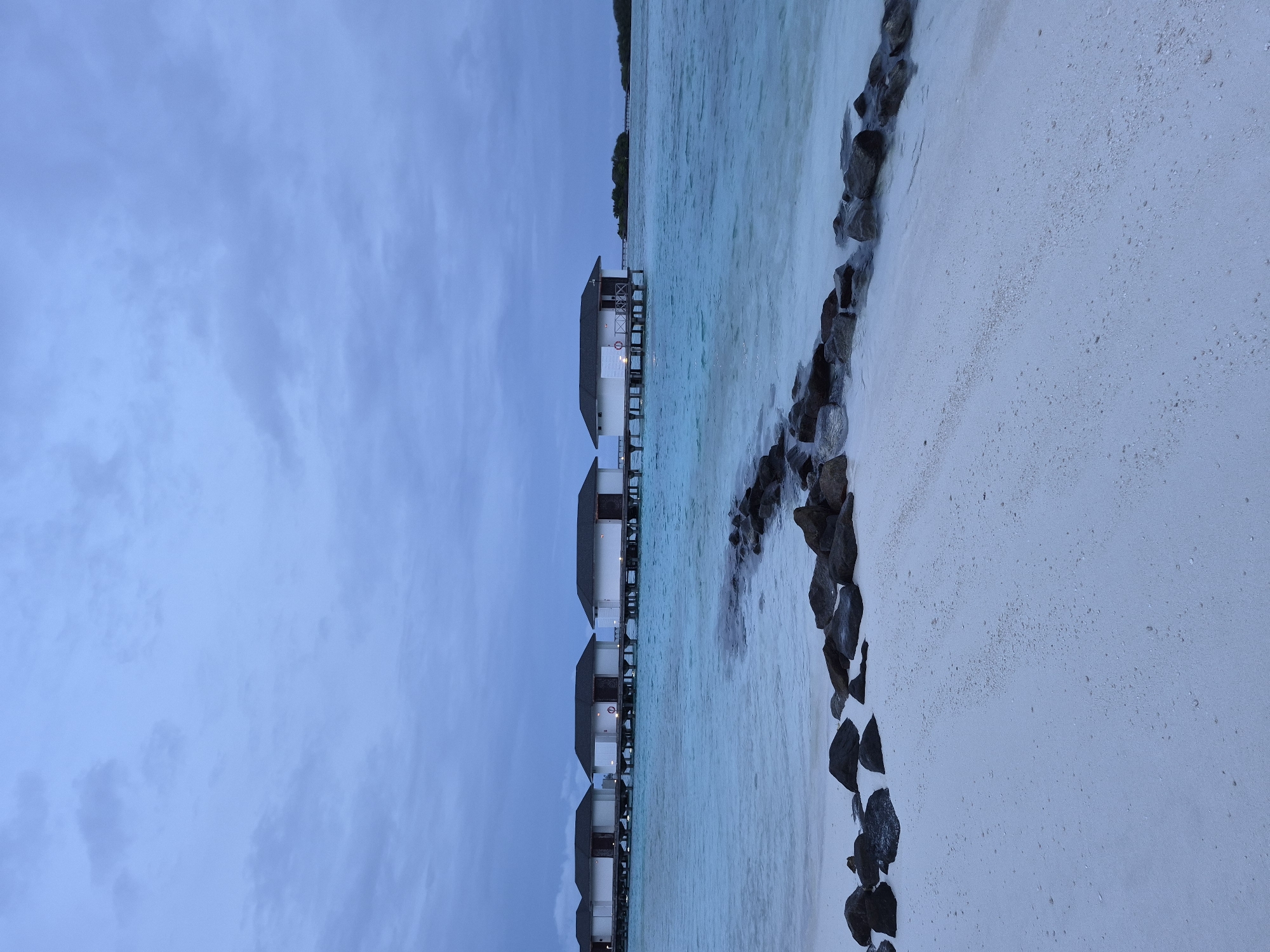 Tourist documents typical resort scenes in Huraa, Maldives
