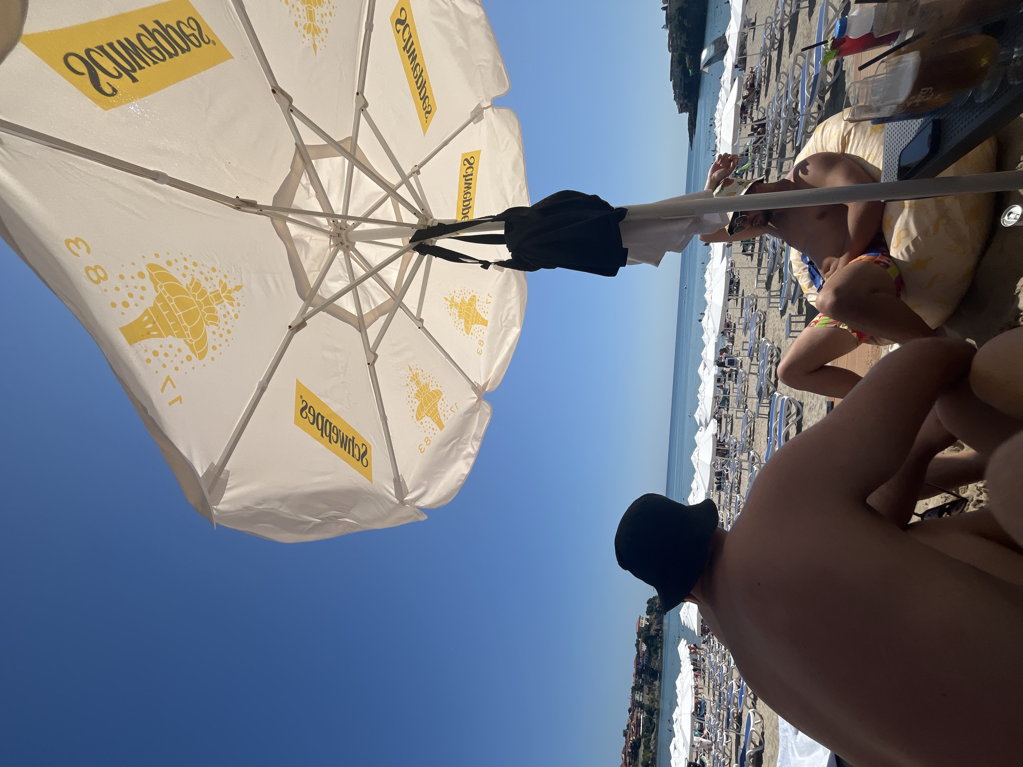 Relaxing under a beach umbrella in Sozopol, Bulgaria
