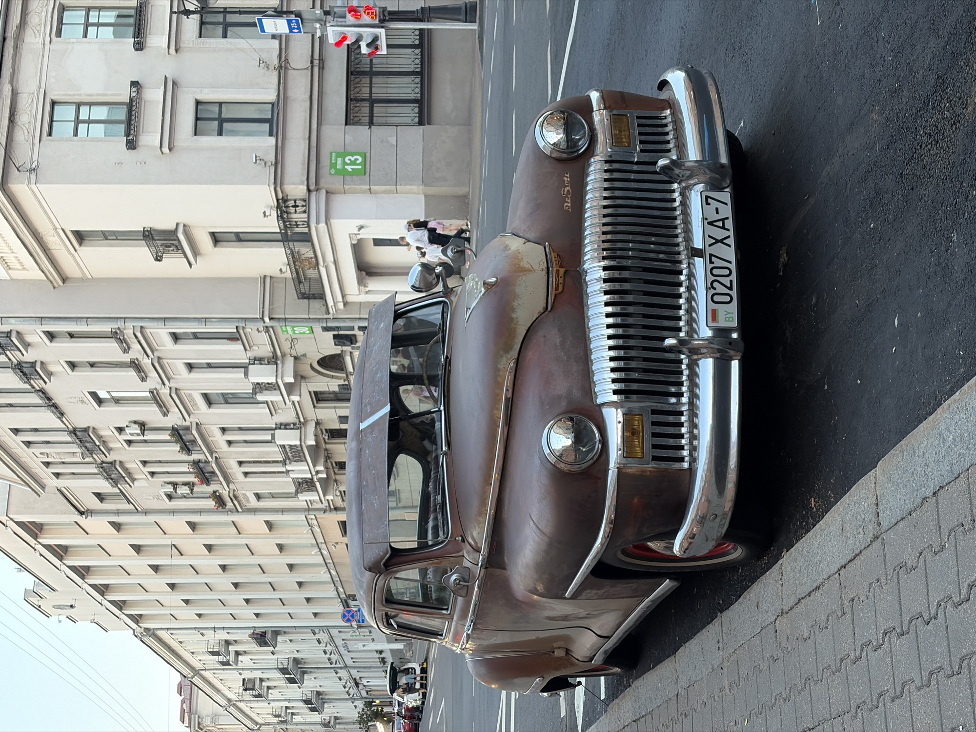 Minsk landmarks, vintage cars, and street life at golden hour