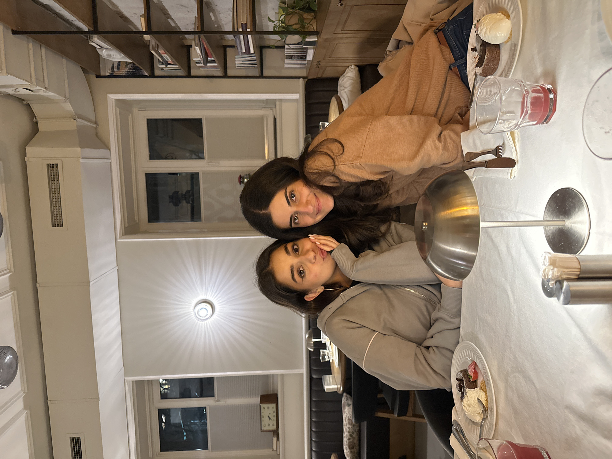 Women dine and photograph meal at Yerevan restaurant