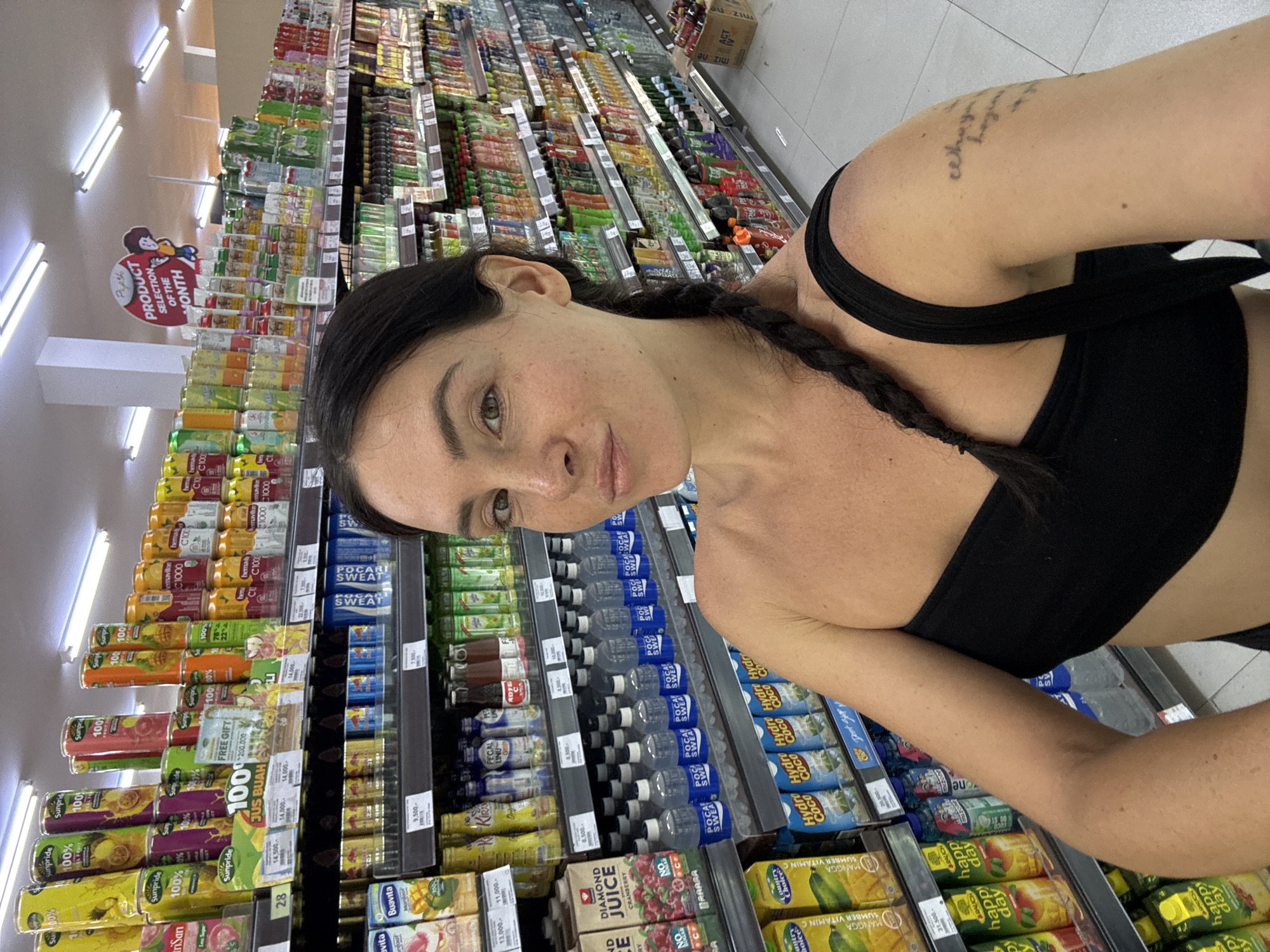 Fresh fruit and drinks fill a North Kuta grocery store