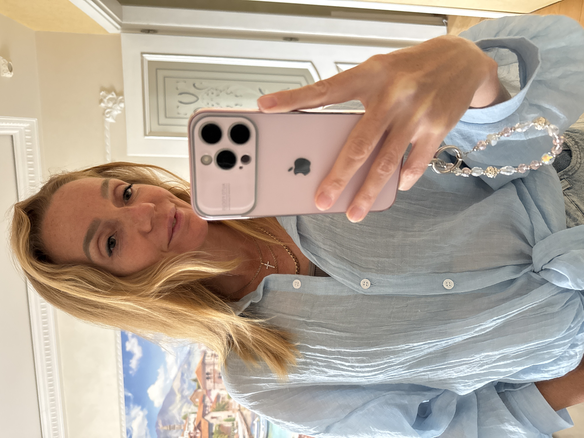 Mirror selfie series with beaded phone charm, Russia