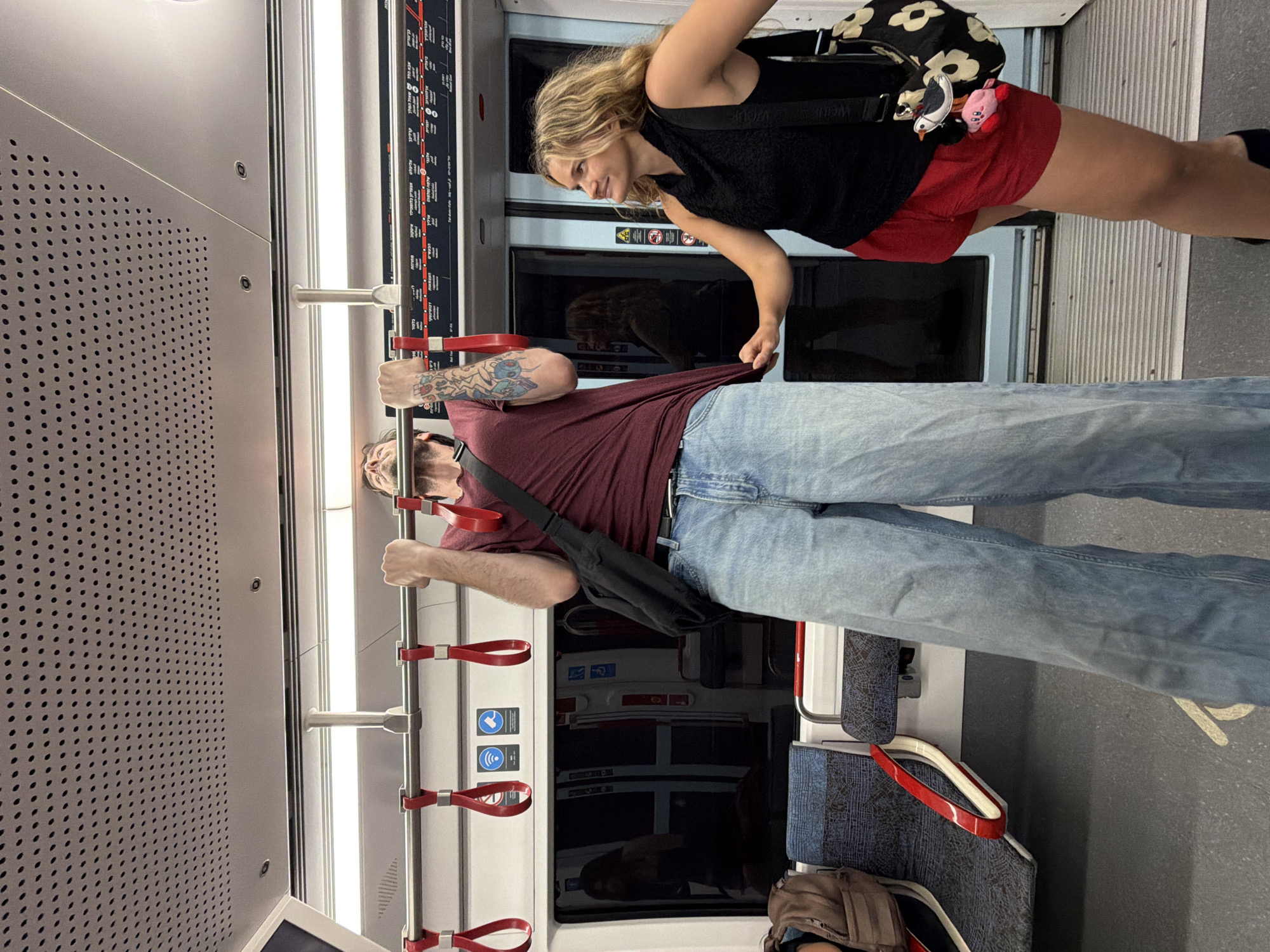 Pull-ups on the overhead bar in a moving transit vehicle
