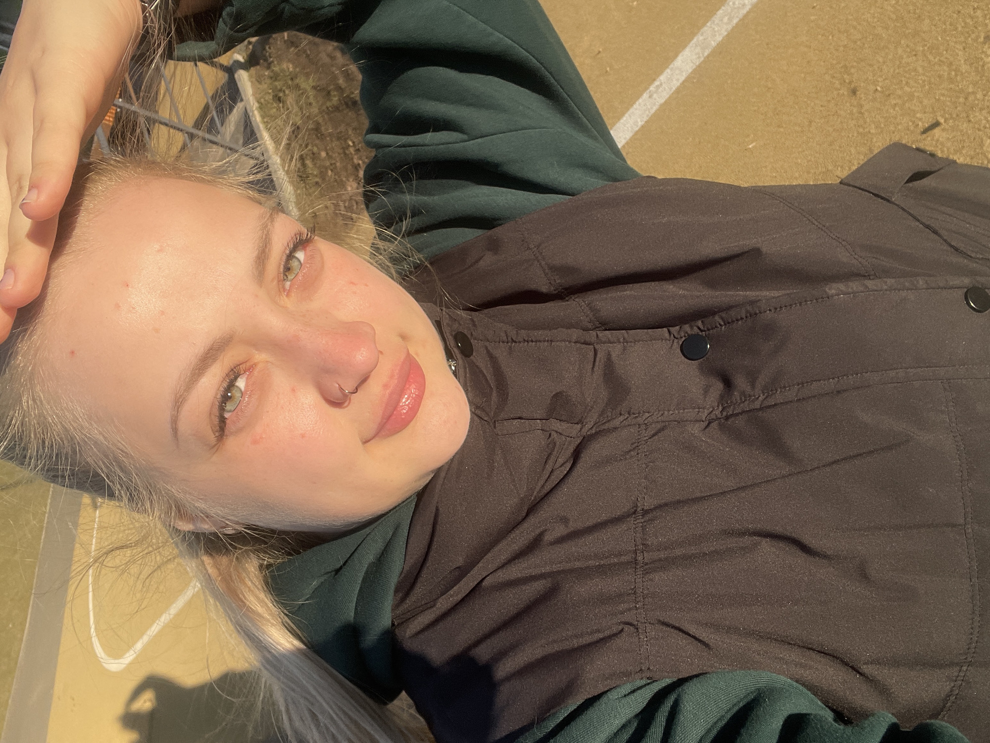 Woman rests on sports court in Izhevsk, Russia