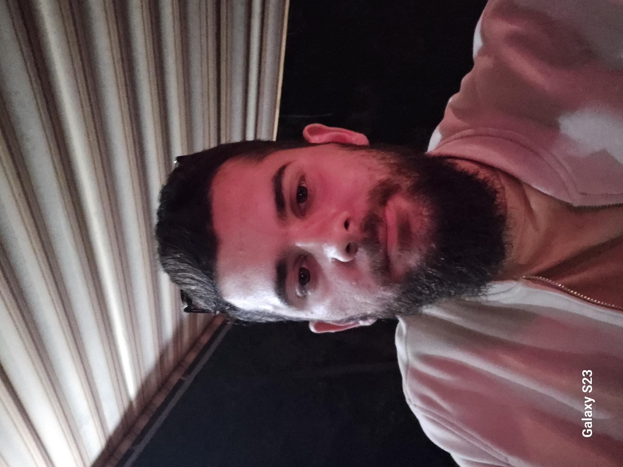 Concert-goer documents outdoor music event with selfies, beer in Sliven