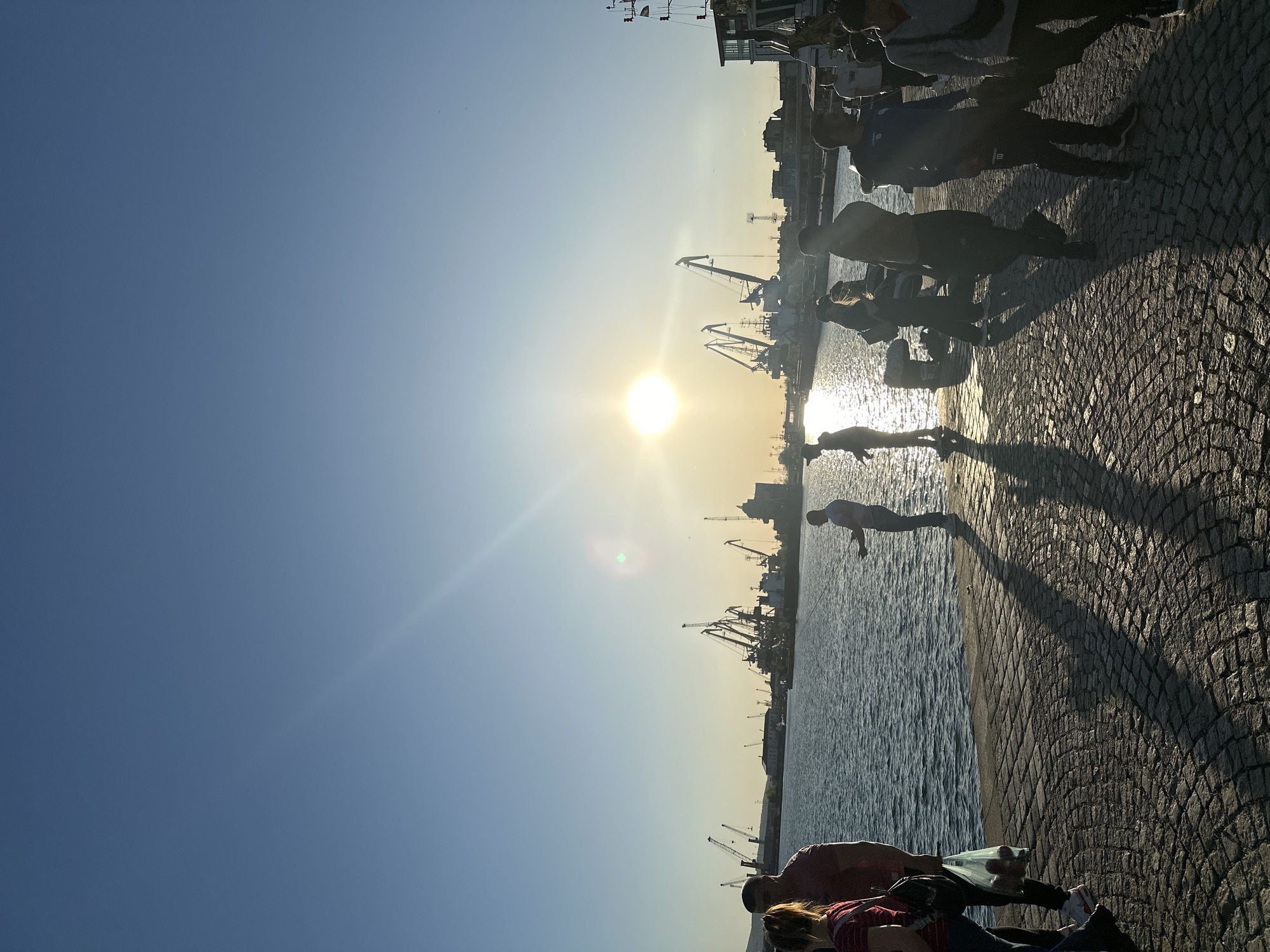 Harbor scenes captured during golden hour at waterfront port