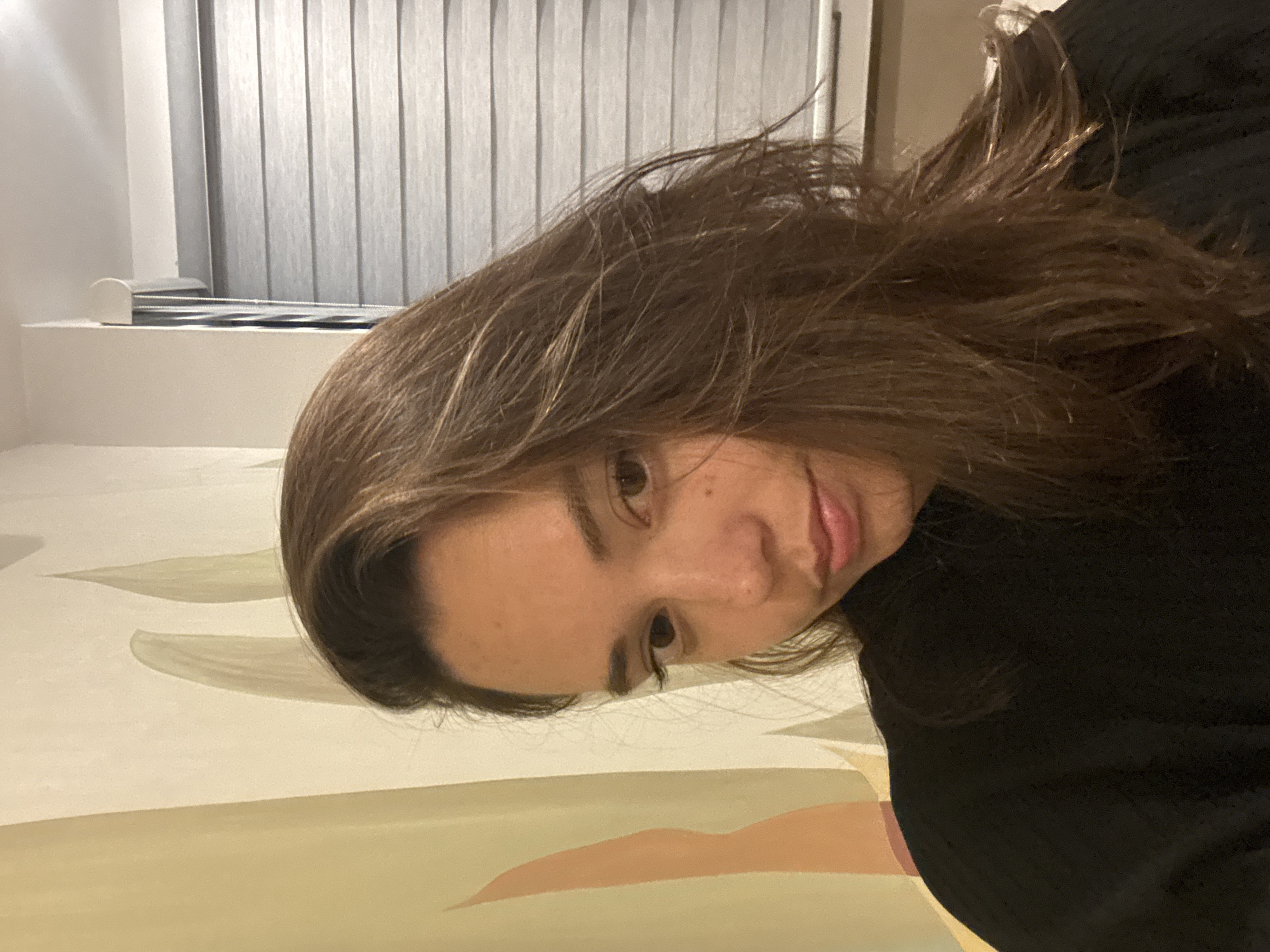 Close-up indoor portrait captured in early morning light