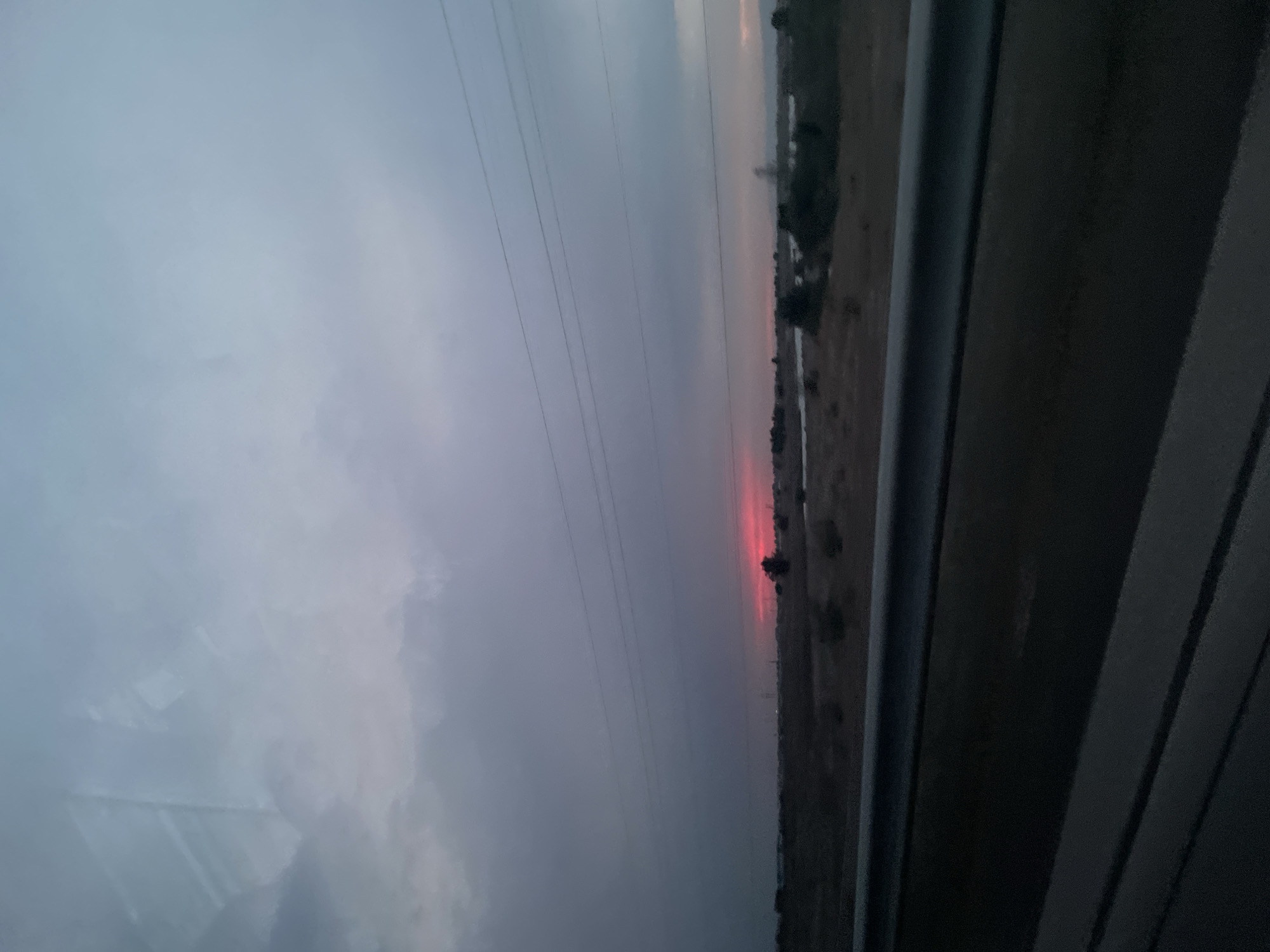 Dusk settles over Kazakhstan's sparse steppe near Shelek