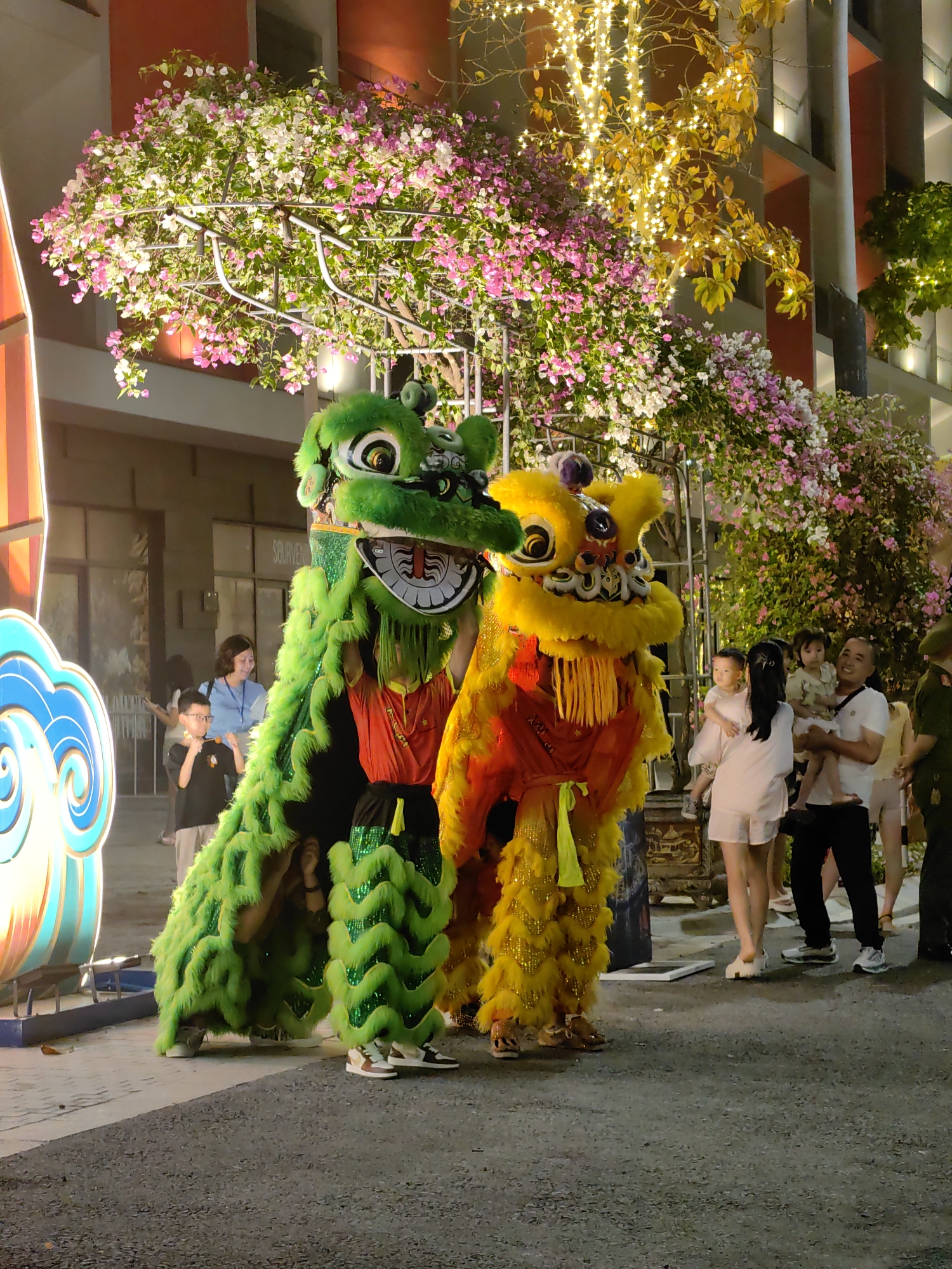 Lion Dance performers entertain crowds in Bai Chay Ward