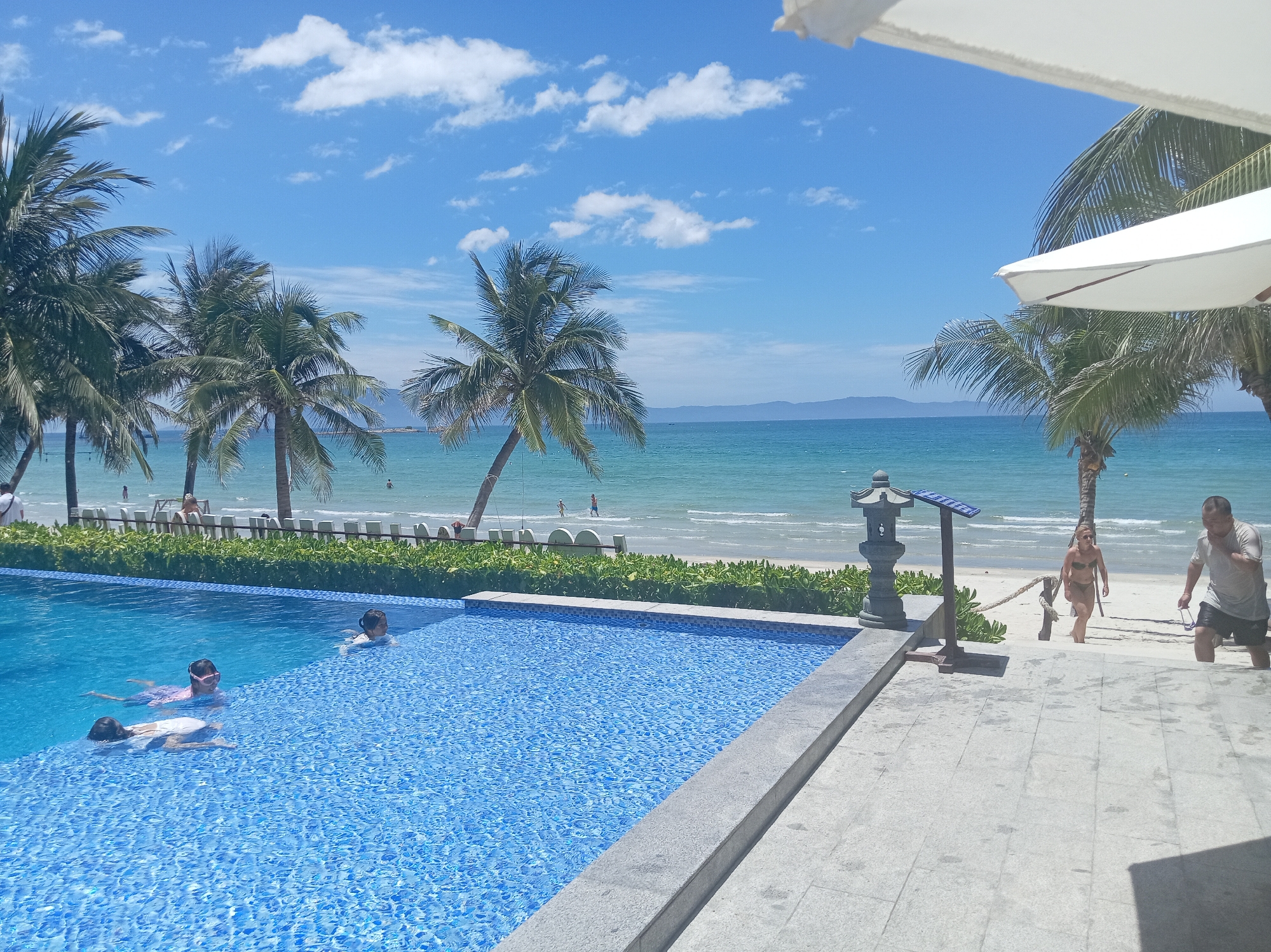 Resort pool and beachfront, Dong Ninh Hoa, quiet morning