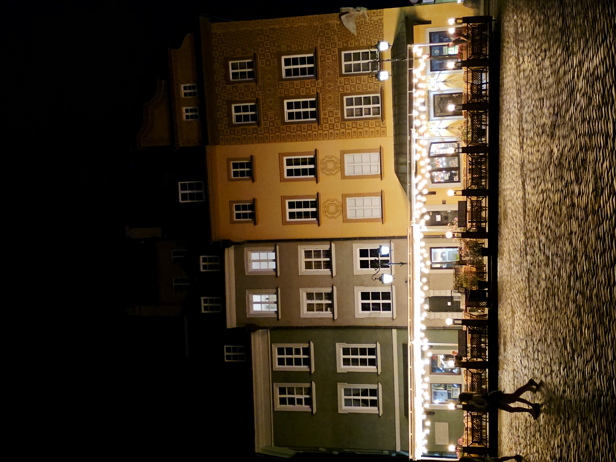 Warsaw's historic center glows on a summer night