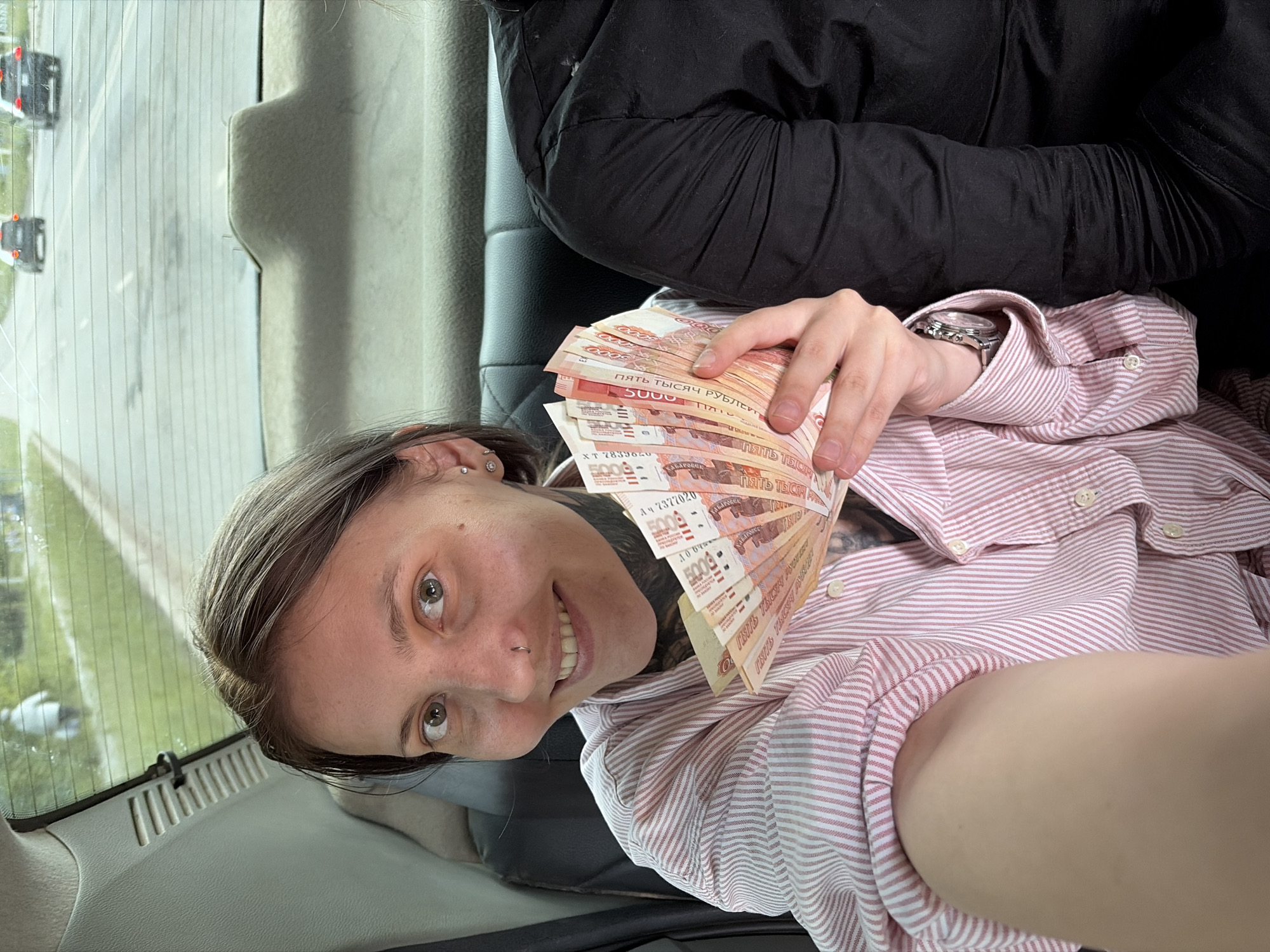 Woman documents afternoon with pet cat in Chaikovsky, Russia