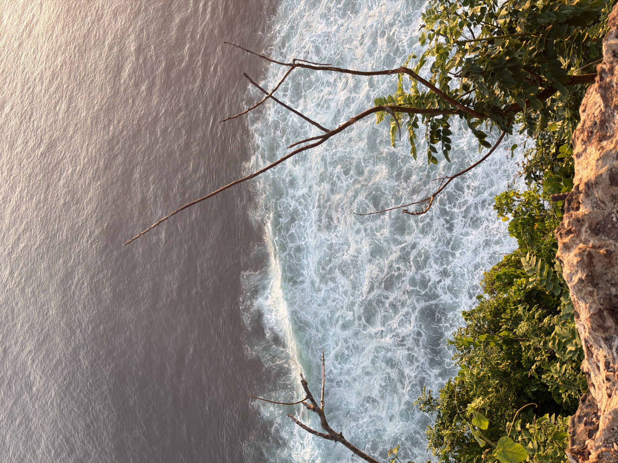 Sunset documented along Kuta Selatan cliffs and coastline