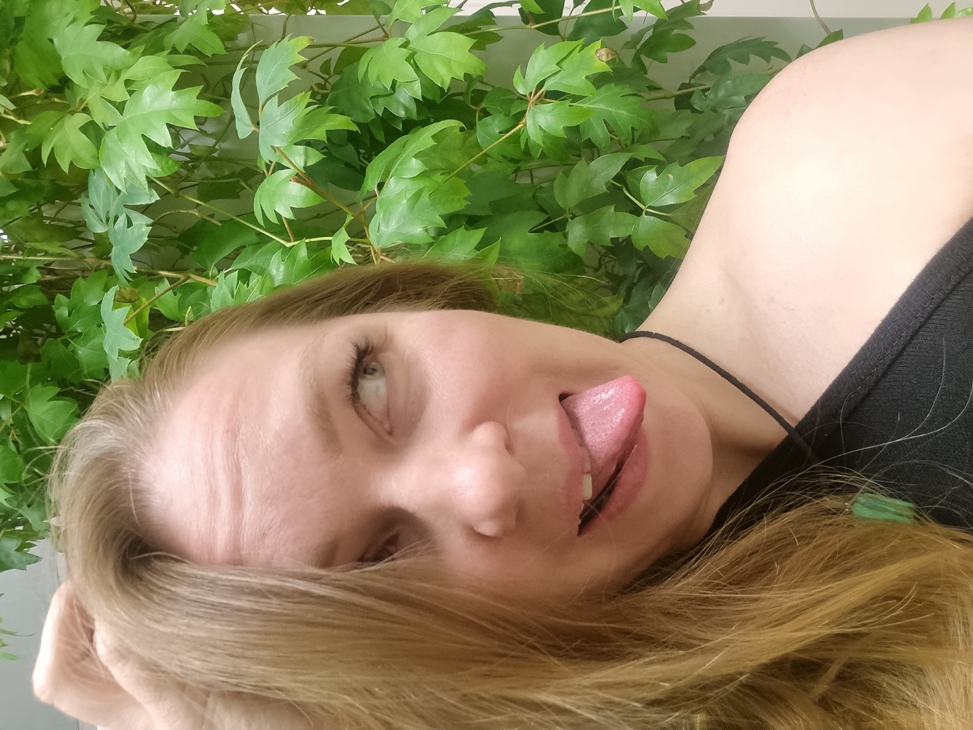 Woman photographs herself in multiple poses in Kemul, Russia