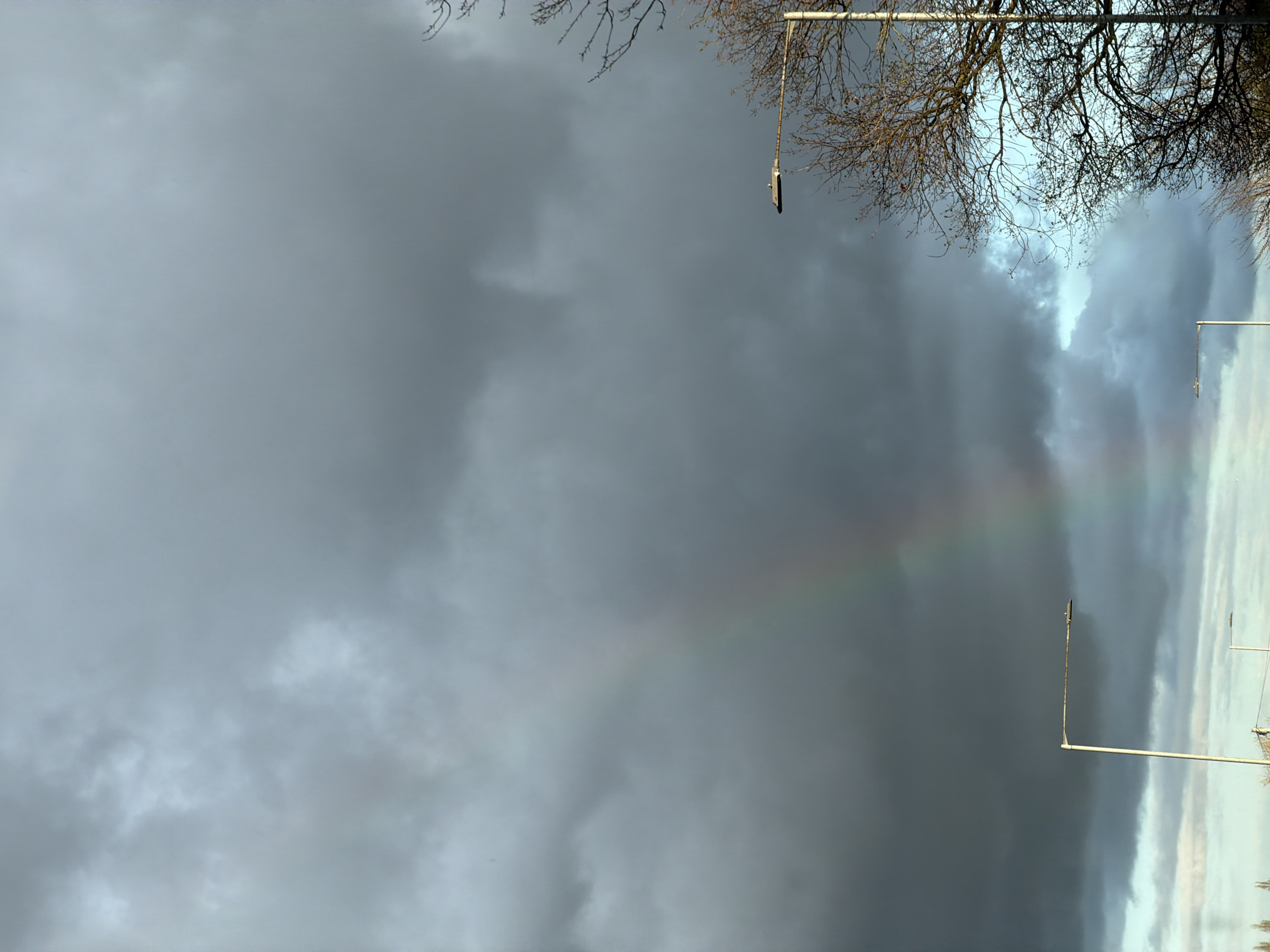 Partial rainbow spotted amid overcast skies in Sandycroft