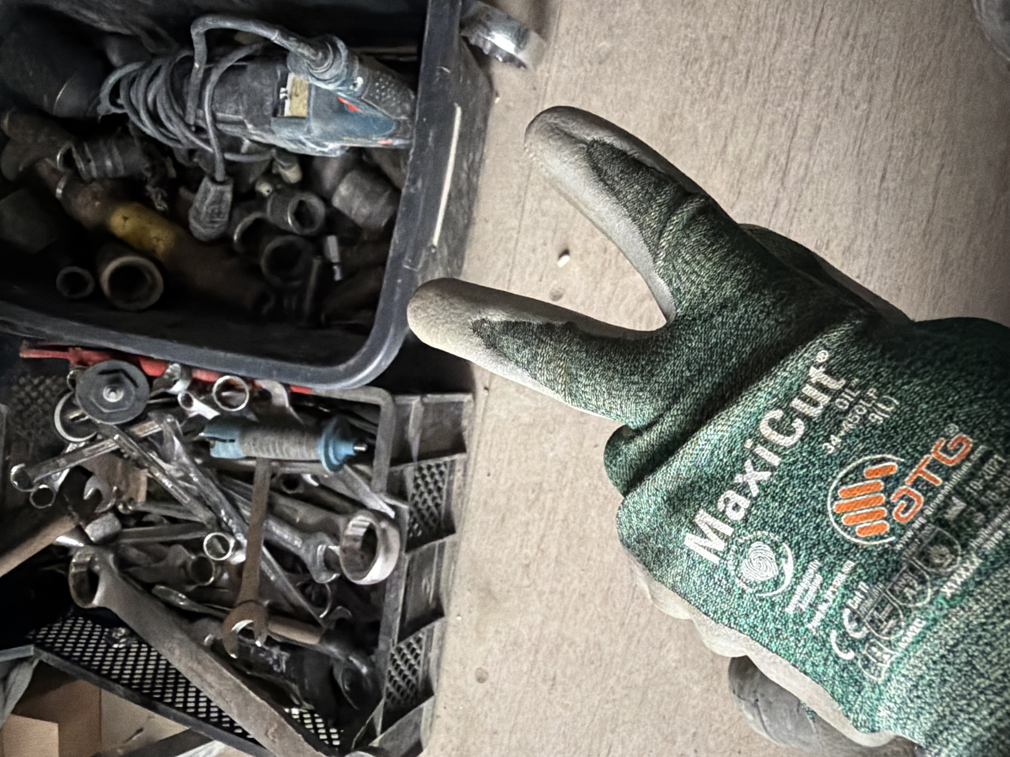 On-site selfies and gear shots from a container workspace in Janowice