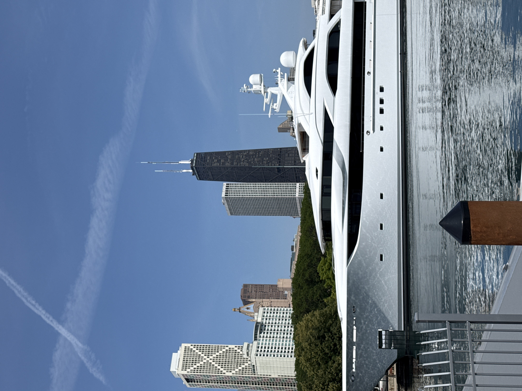 Large white luxury yacht docked at Chicago harbor