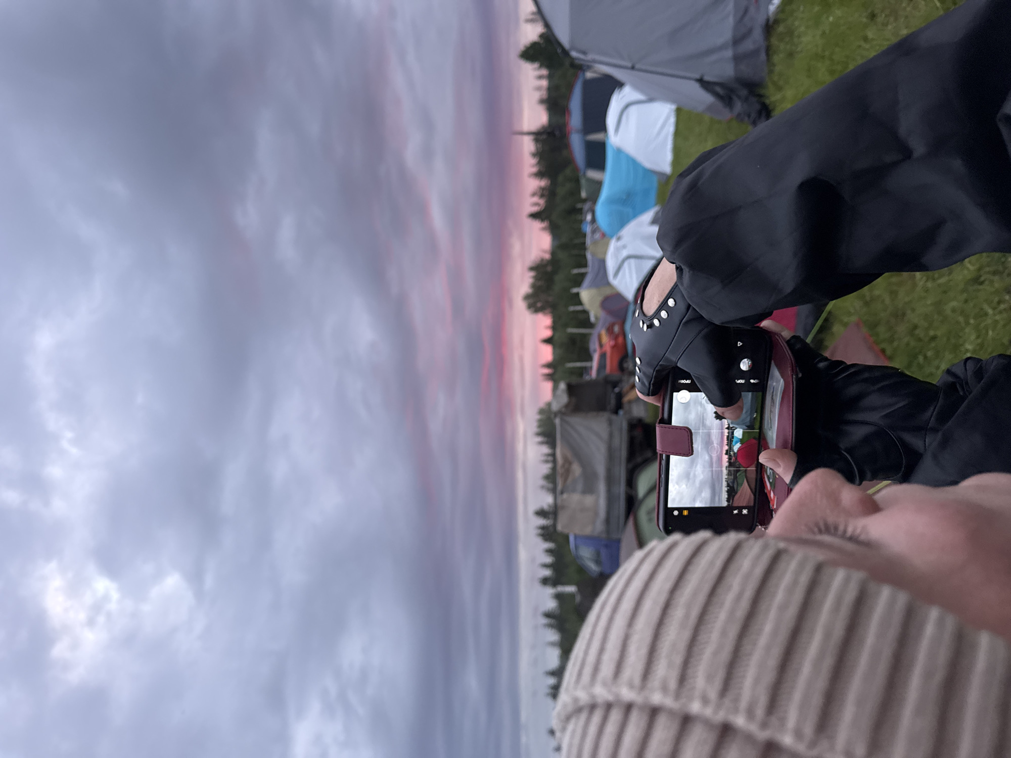 Outdoor festival with music, markets, campfires in rural Russia