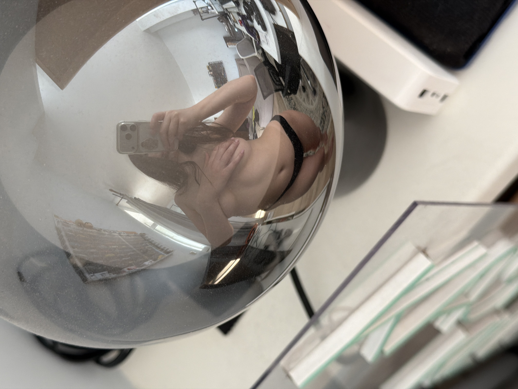 Outdoor selfies in Khimki, one caught in a mirrored sphere