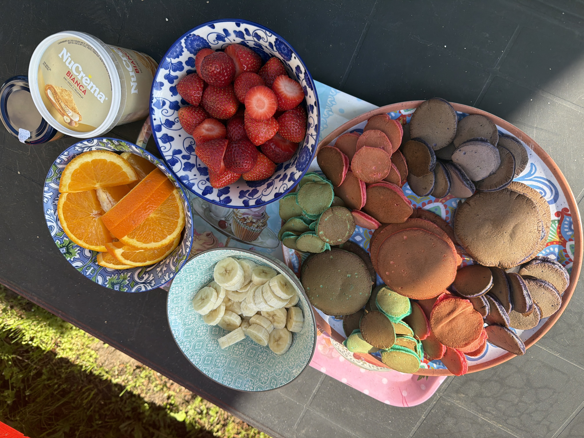 Morning outdoor breakfast setup documented in Bistritsa garden