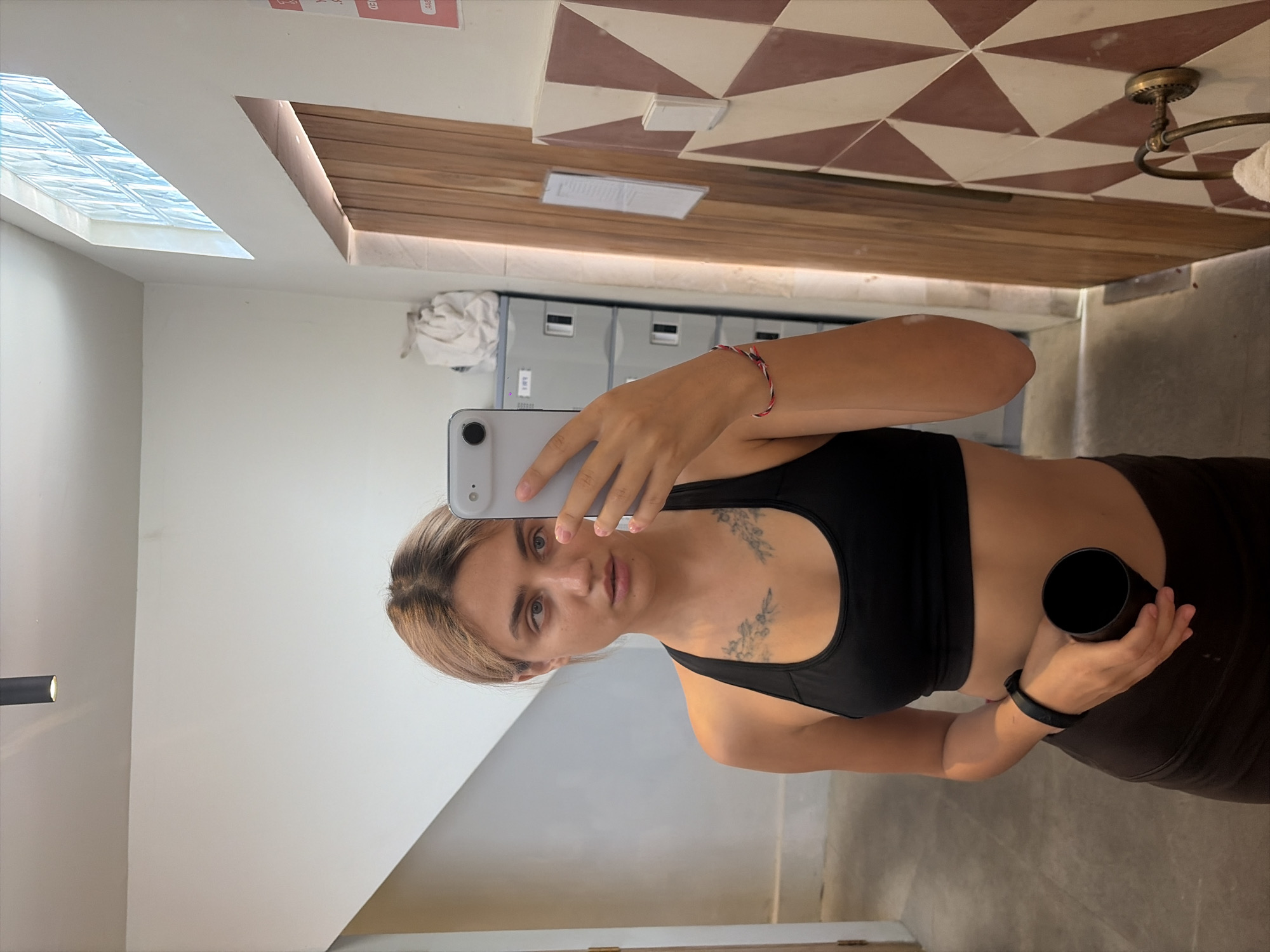 Workout mirror selfie and stone Buddha statue, North Kuta Bali