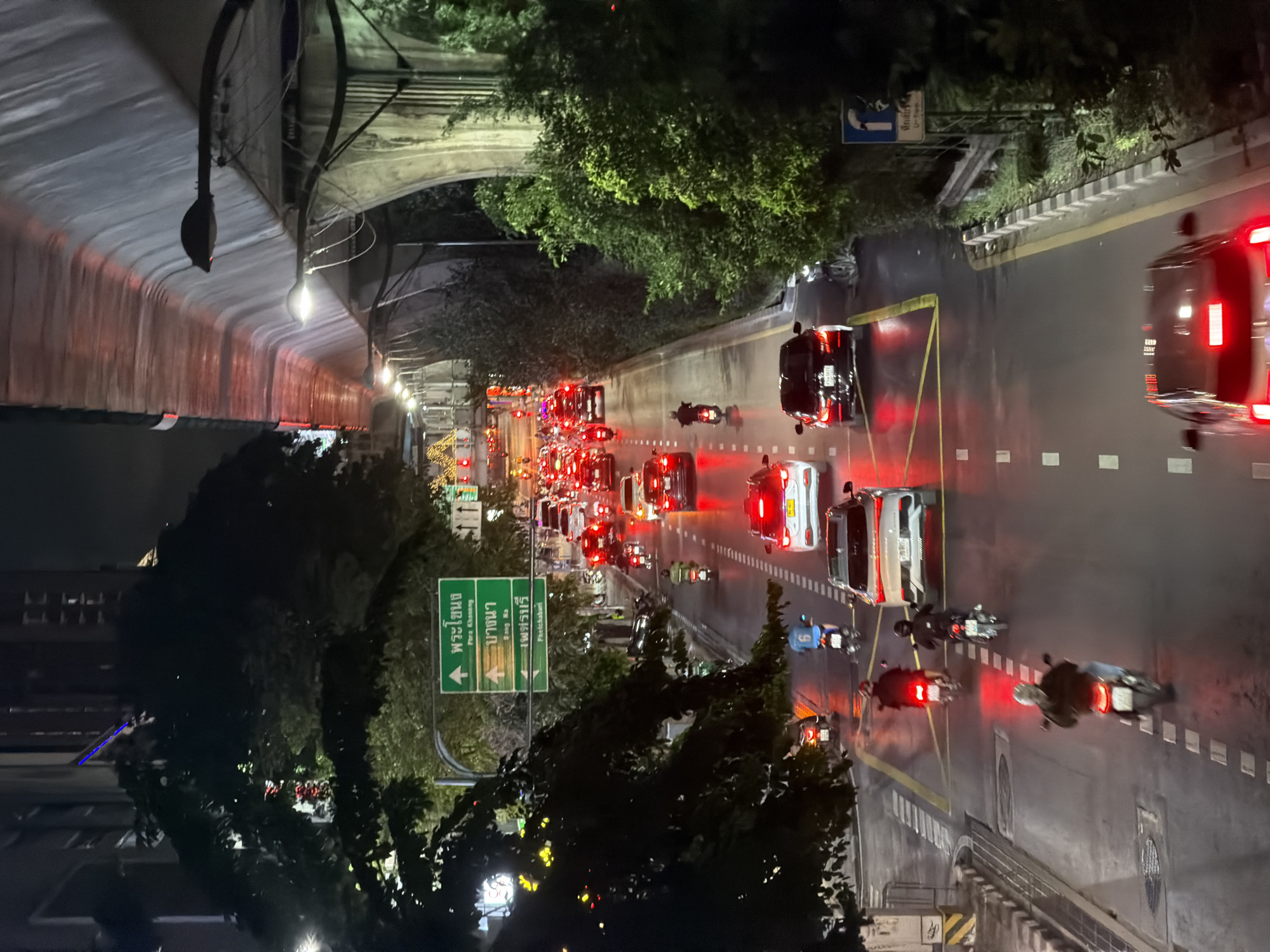 Heavy nighttime traffic observed on unidentified urban street
