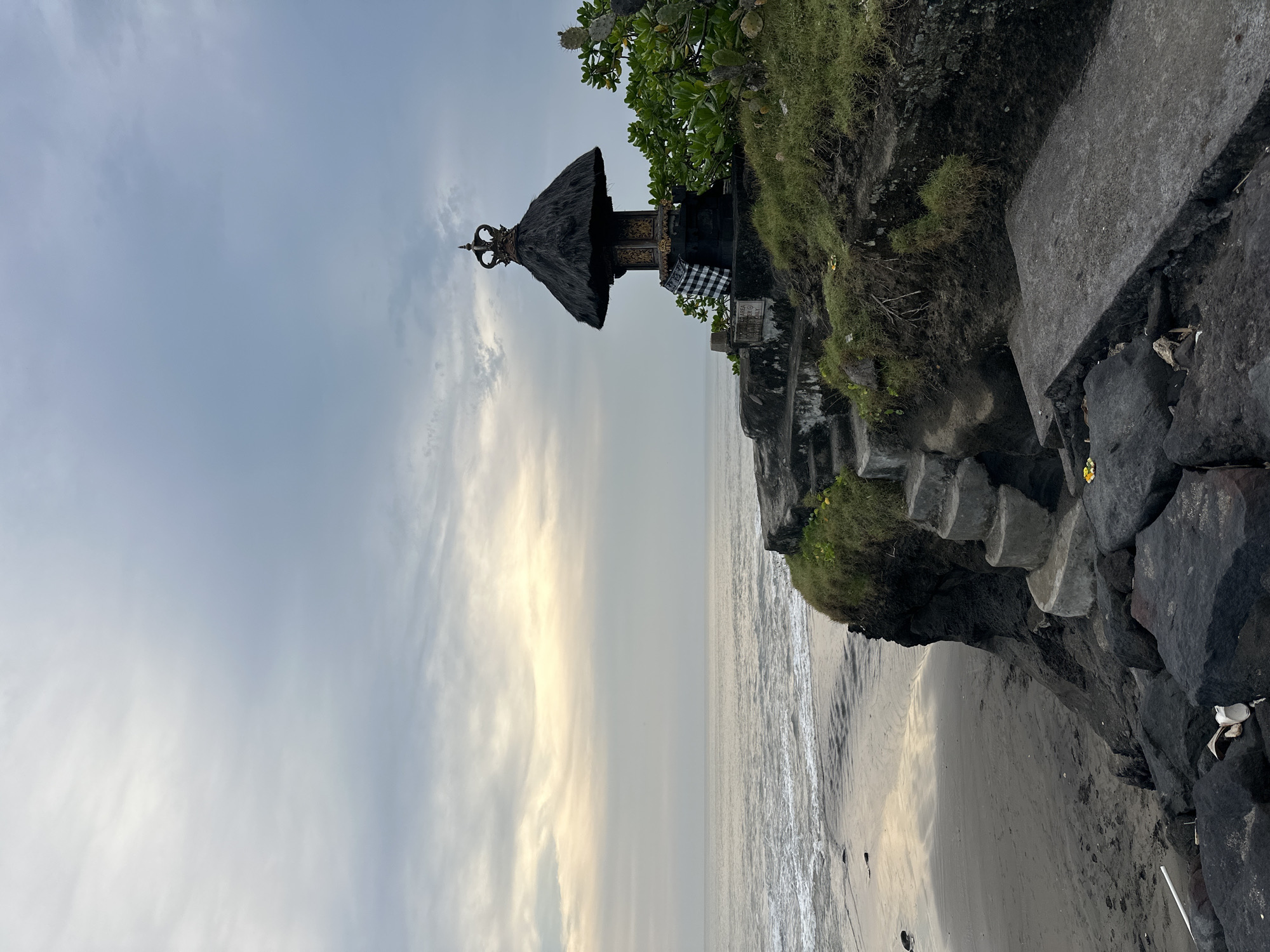 Traditional Balinese shrine observed on coastal cliff in Belalang