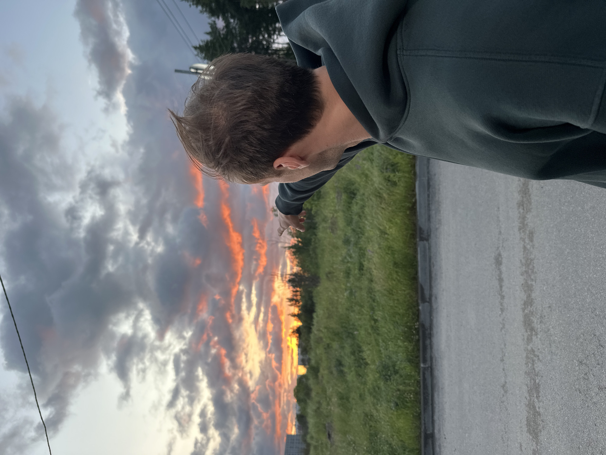 Friends catch a striking sunset in Murino on a summer evening