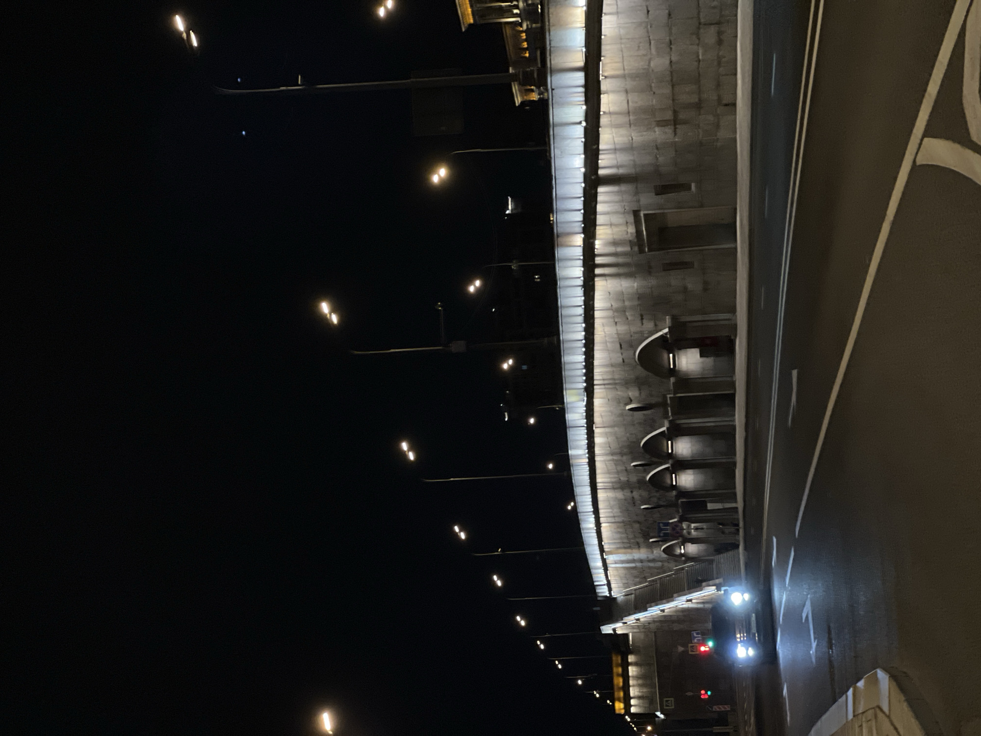 Moscow nighttime architecture observed in tunnel and cylindrical building