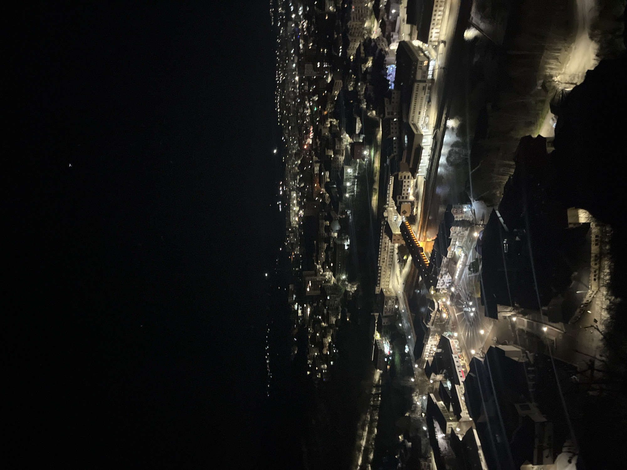 Aerial nighttime view captures illuminated Lovech, Bulgaria from above
