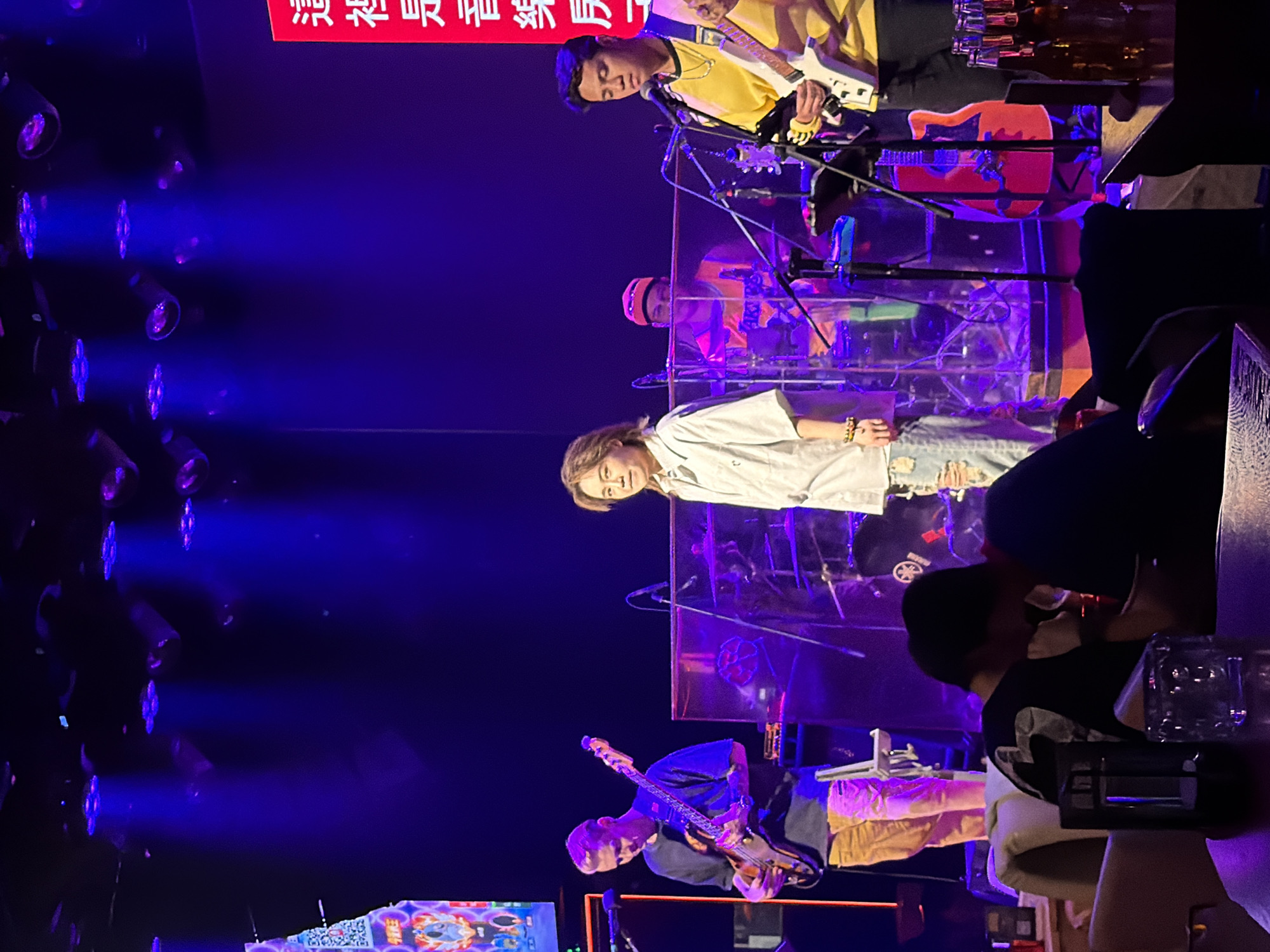 Live band performs with colorful lighting in Jiangbei, China