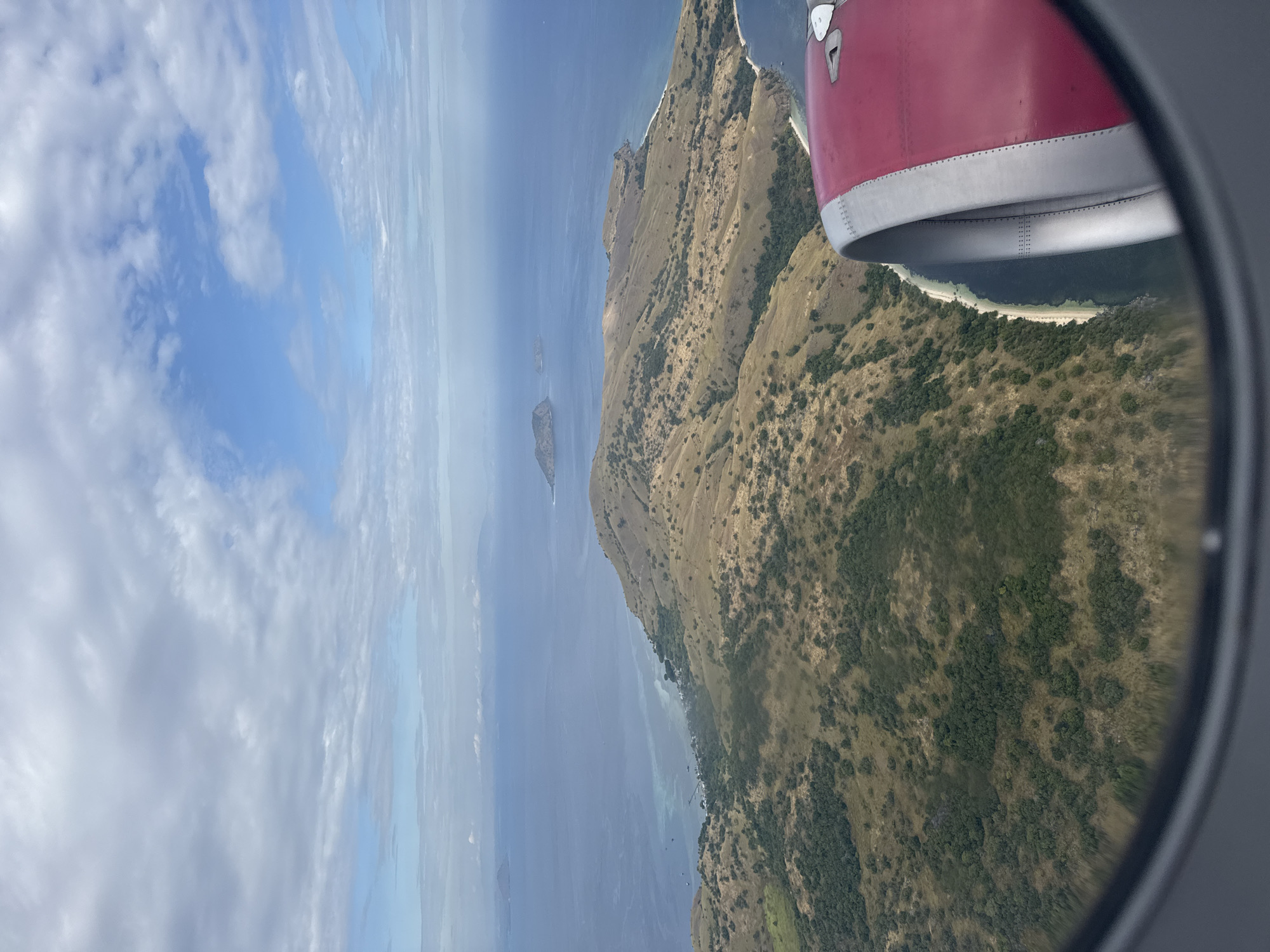 Passenger documents hour-long flight with aerial island views