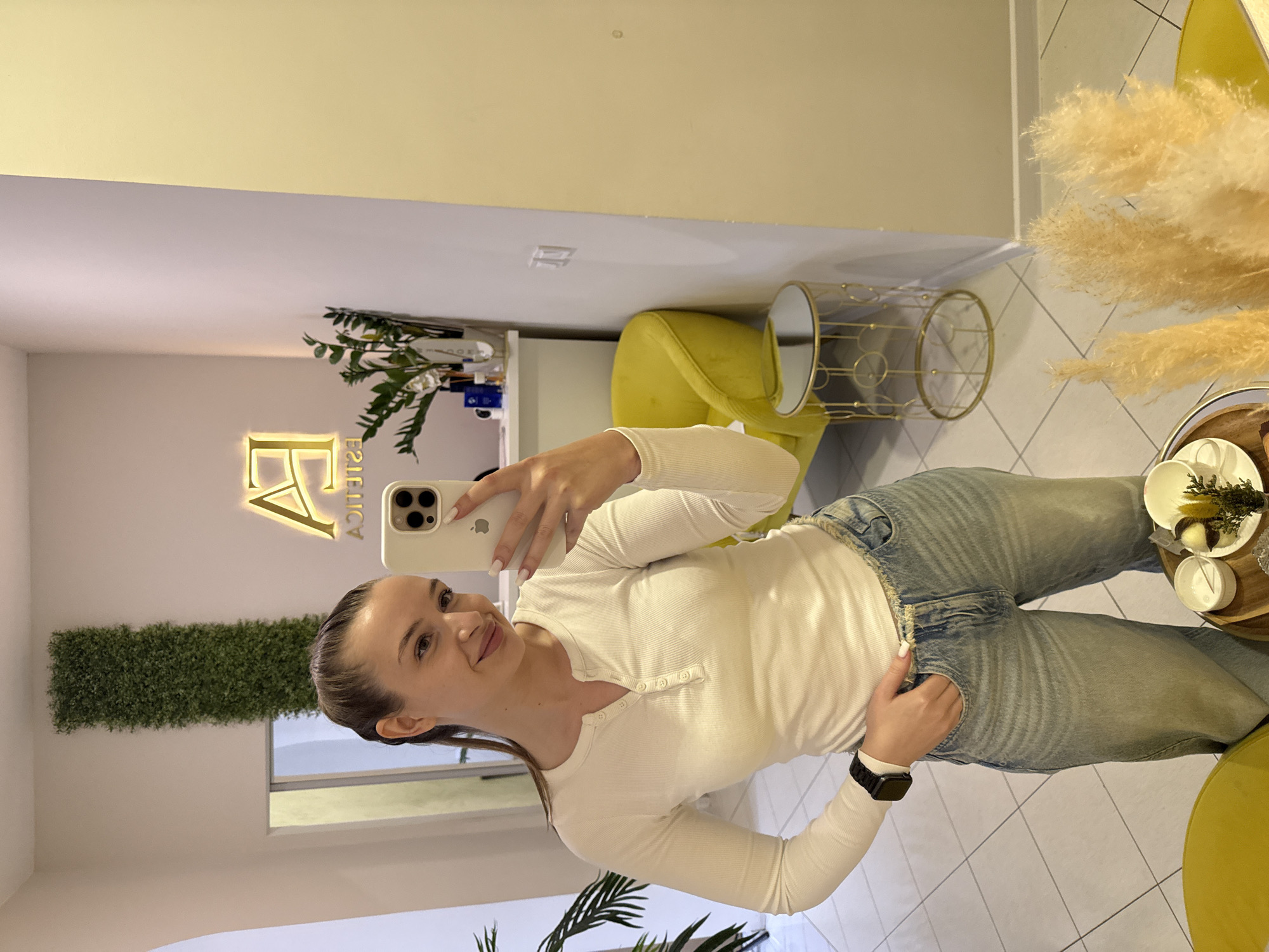 Woman photographs herself at aesthetic clinic in Budva