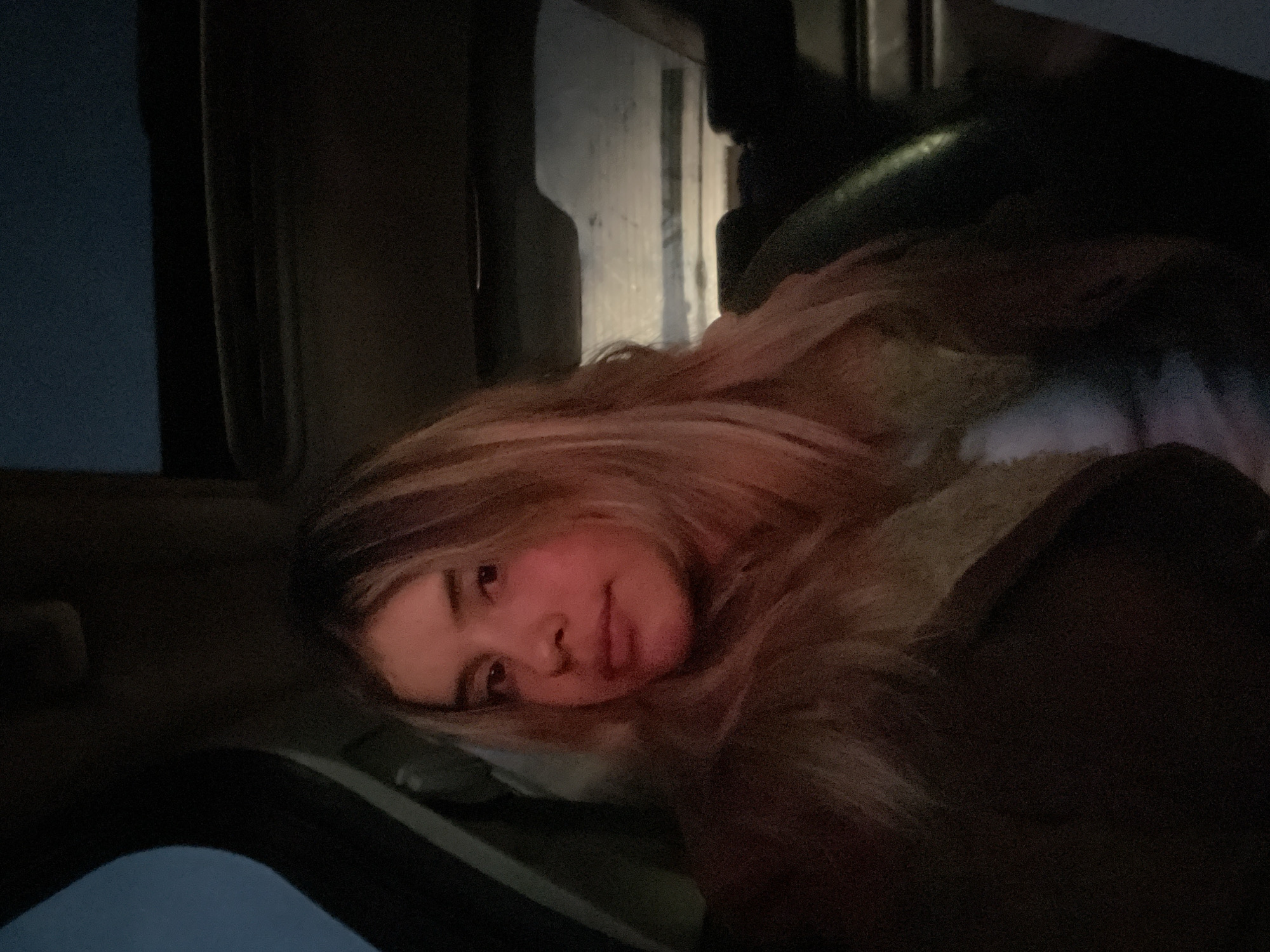 Woman photographed resting in vehicle in Catamarca, Argentina