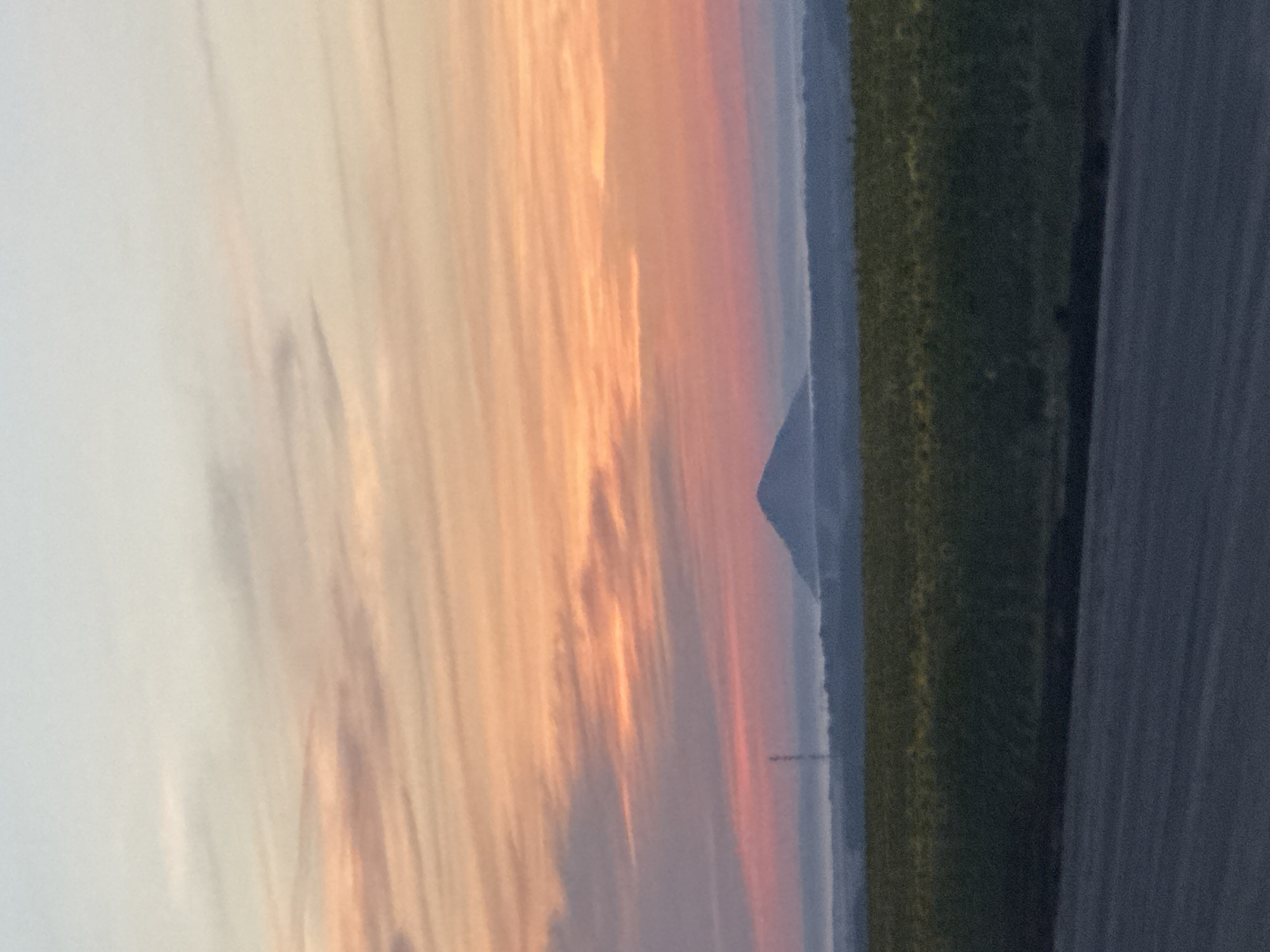 Dusk over open Russian countryside, road and fields at sunset