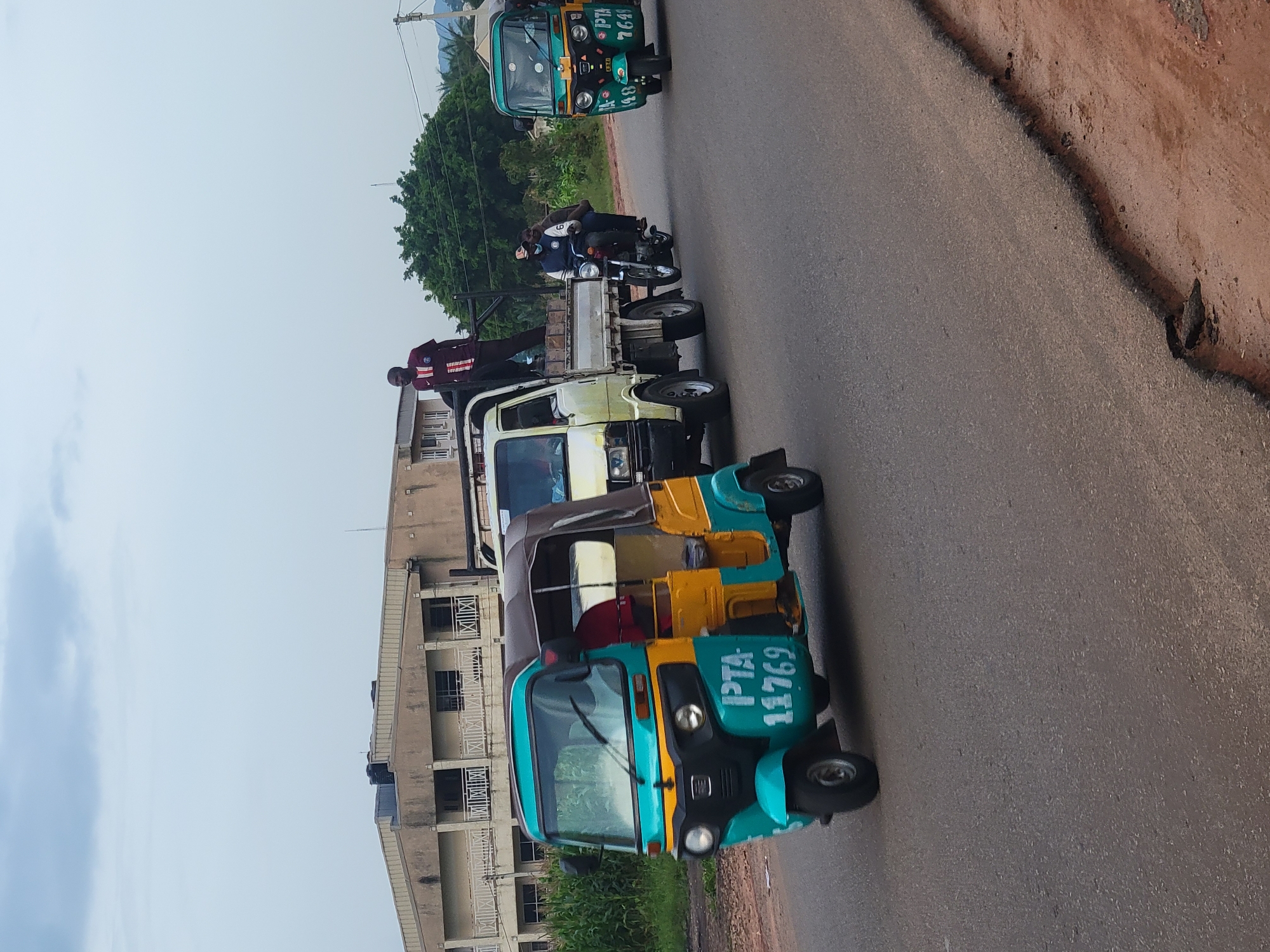 Everyday street life moving through Jos, Nigeria